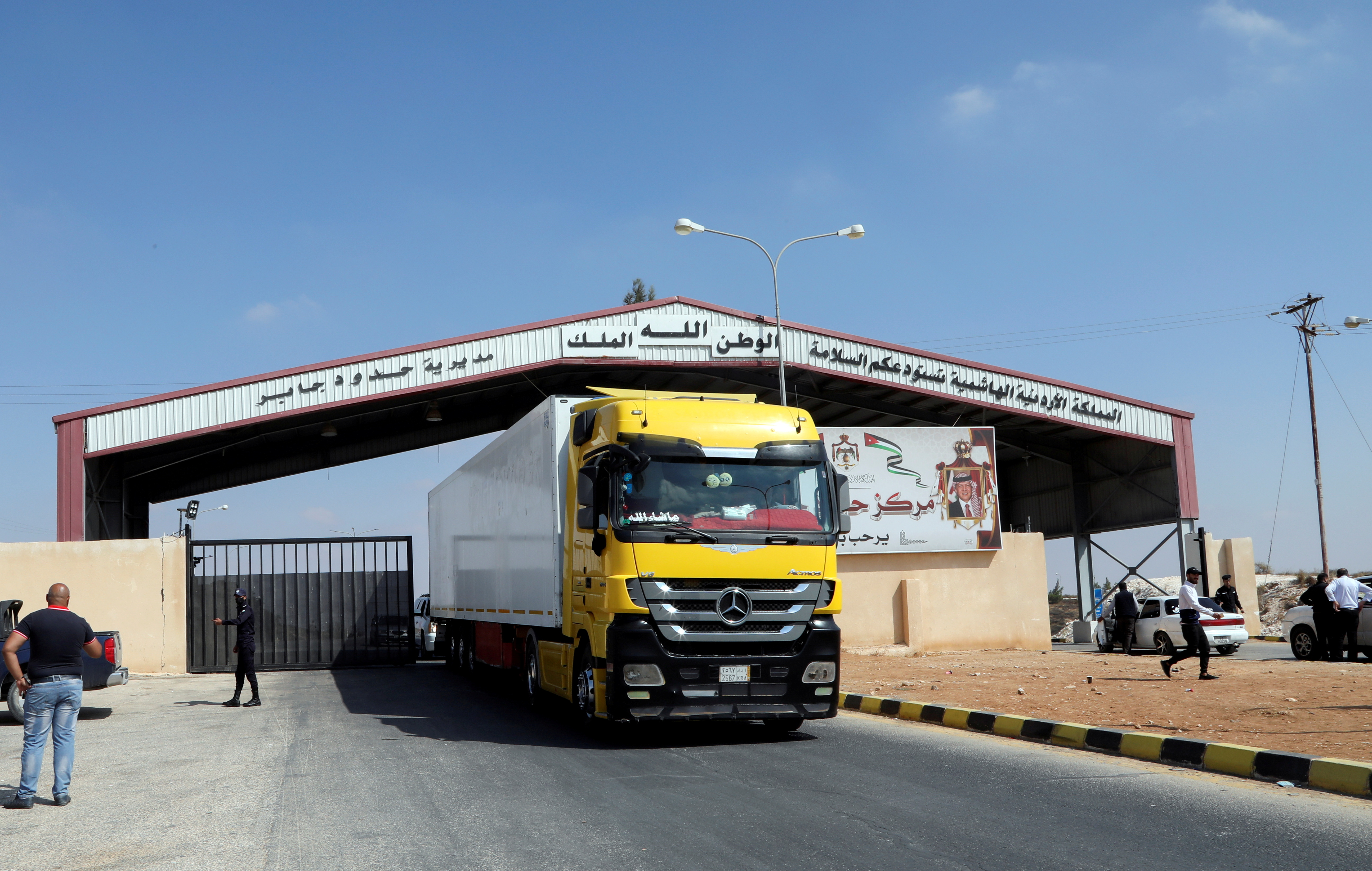 A truck drives through the major Jaber border crossing with Syria, near Mafraq