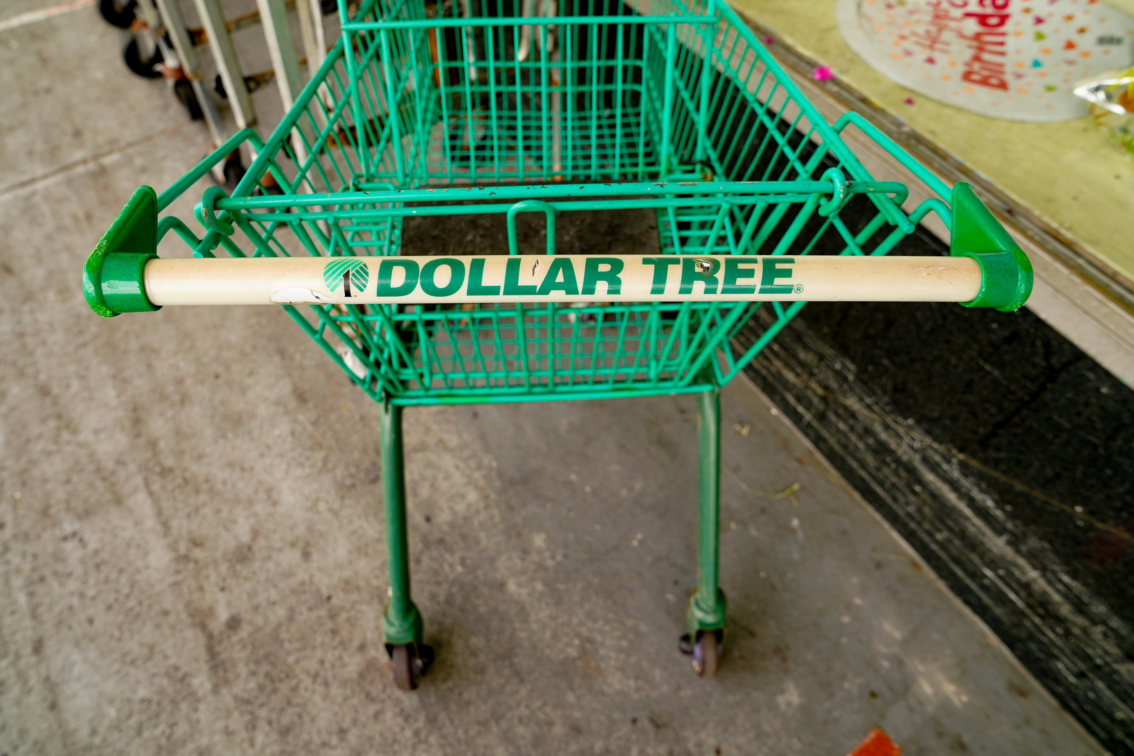 A shopping cart is seen outside a Dollar Tree store in Mount Rainier, Maryland