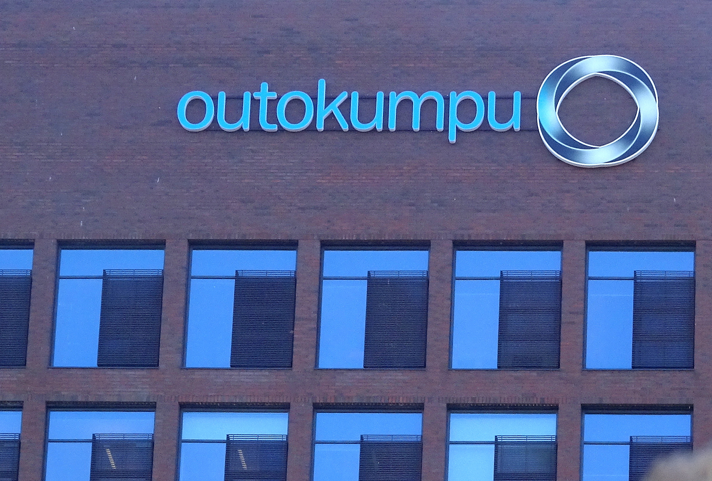 Outokumpu logo is seen at the company's head office in Helsinki