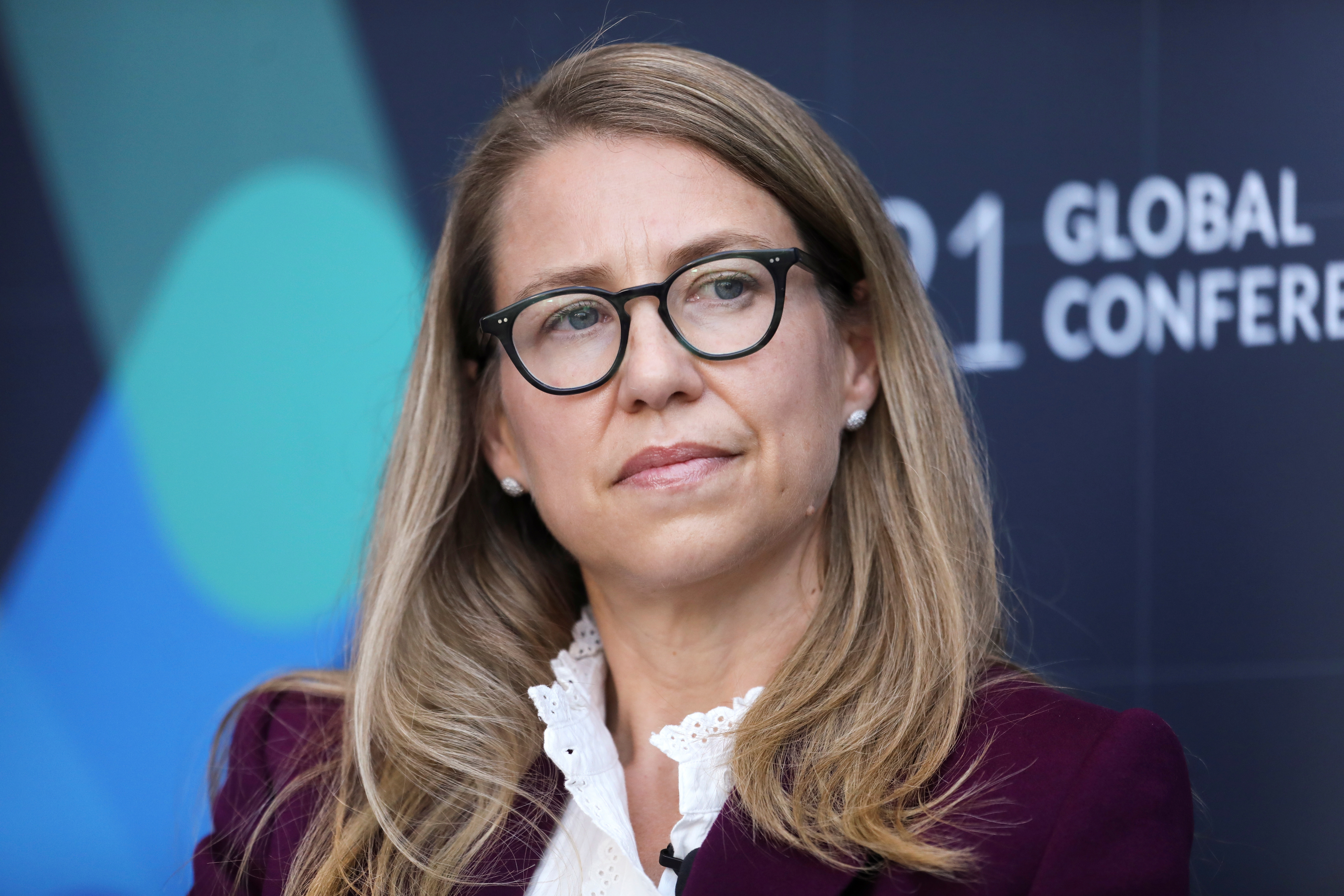 Coinbase Chief Financial Officer Alesia Haas looks on during the 2021 Milken Institute Global Conference in Beverly Hills, California, U.S., October 18, 2021. REUTERS/David Swanson