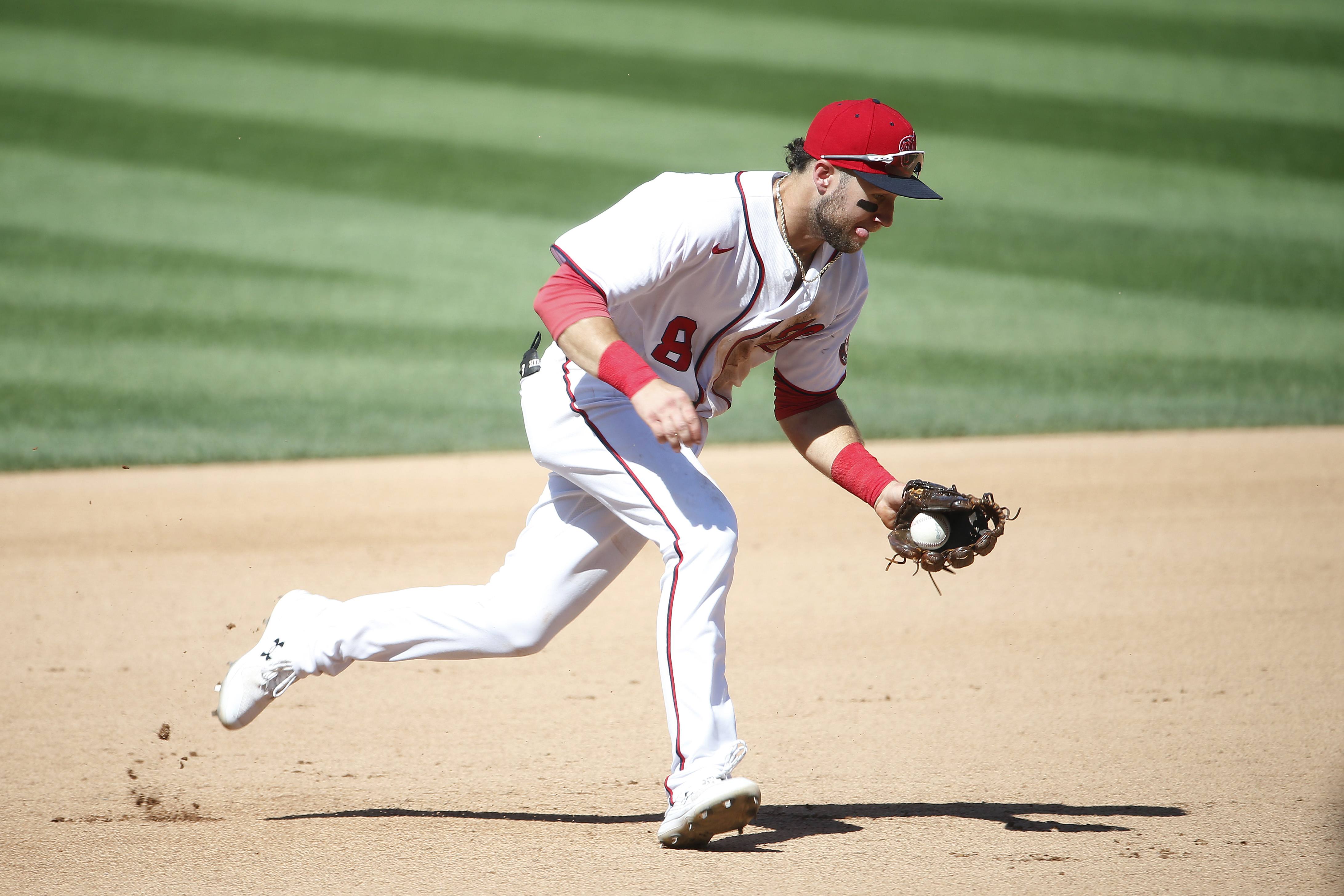 MLB roundup: Pirates escape 9-run hole, stun Reds