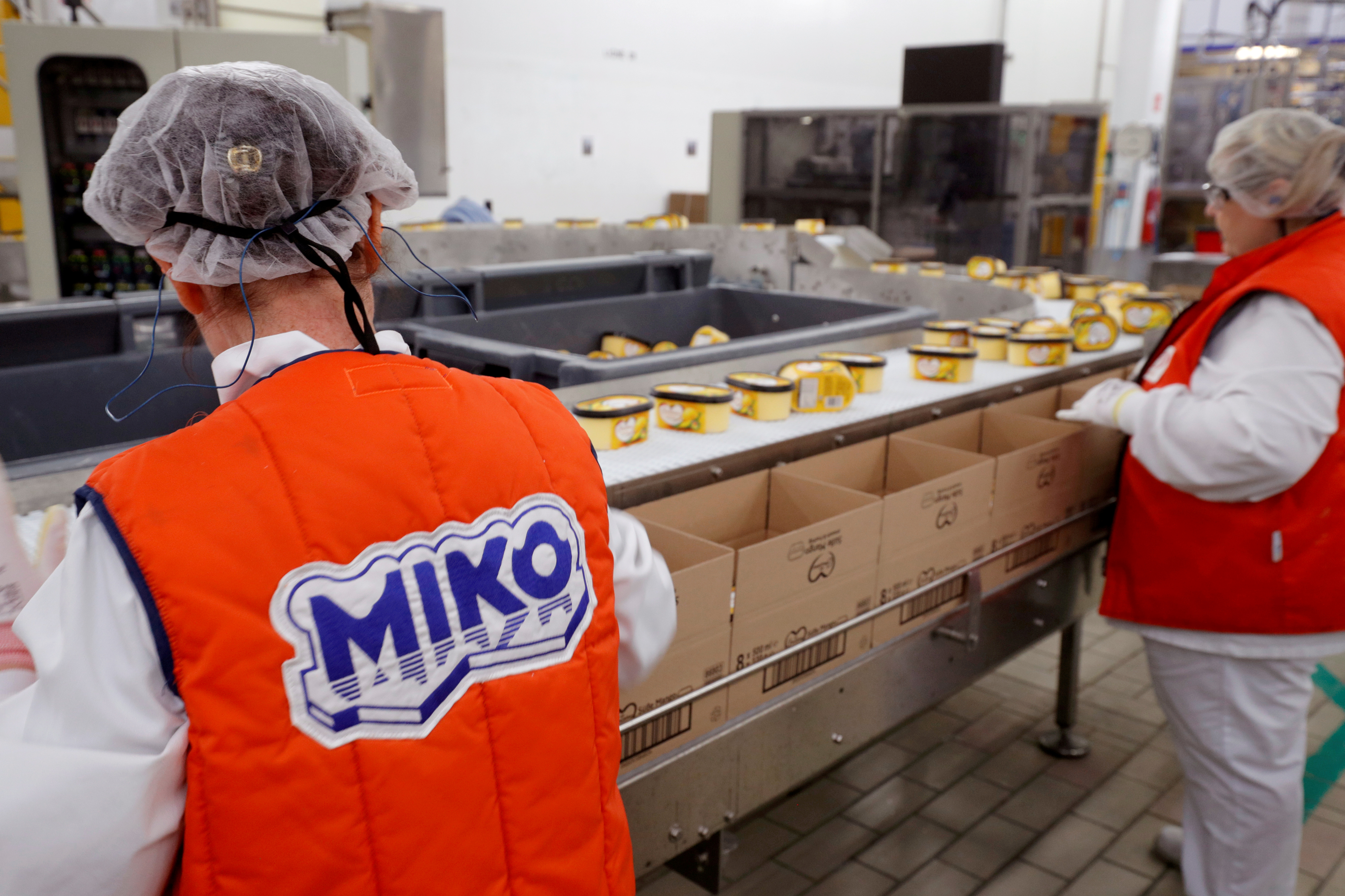 Employees prepare boxes of ice cream at the Miko Carte d'Or, part of the Unilever group, factory in Saint-Dizier