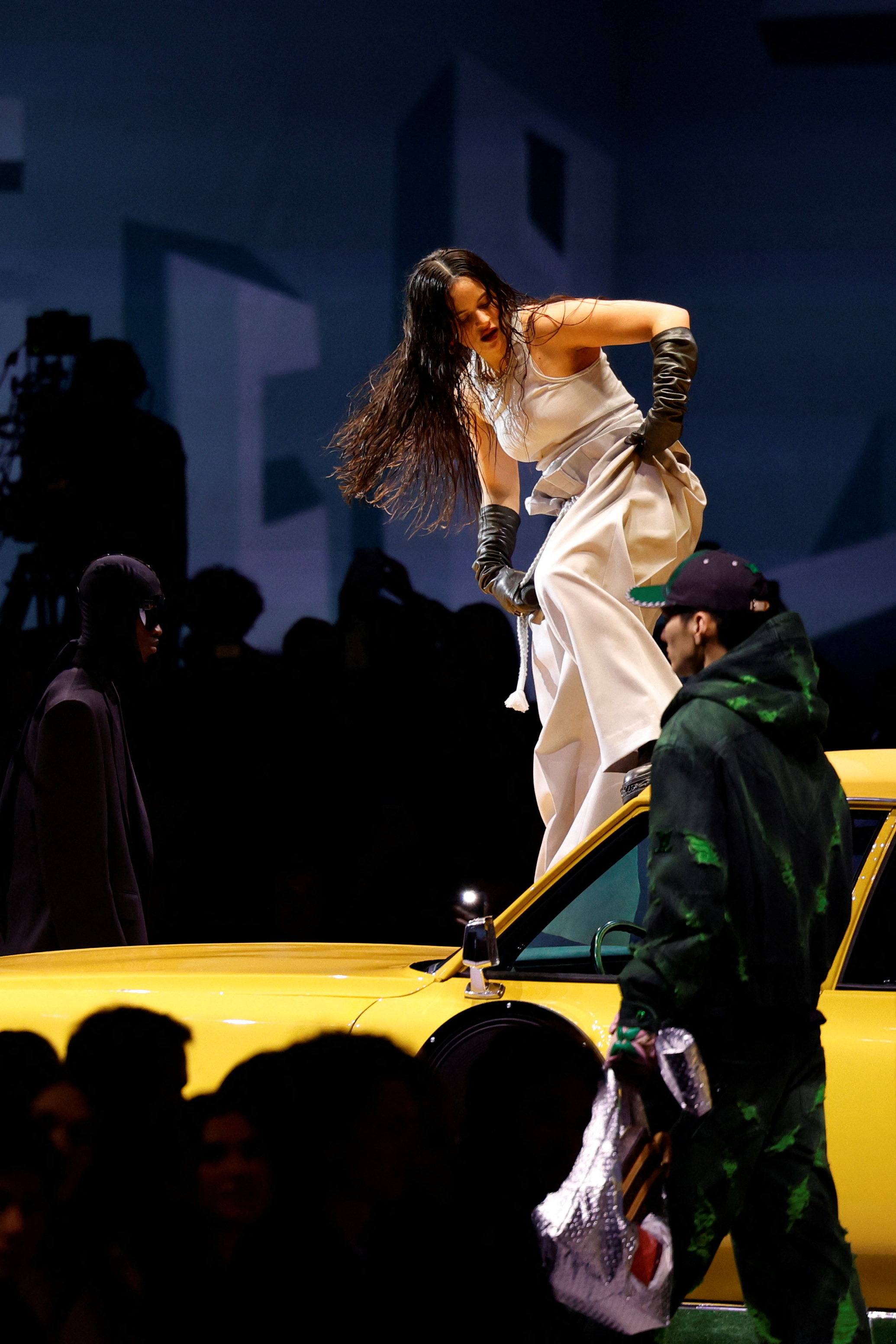 Rosalia Performs at Louis Vuitton's 2023 Menswear Show in Paris – Footwear  News