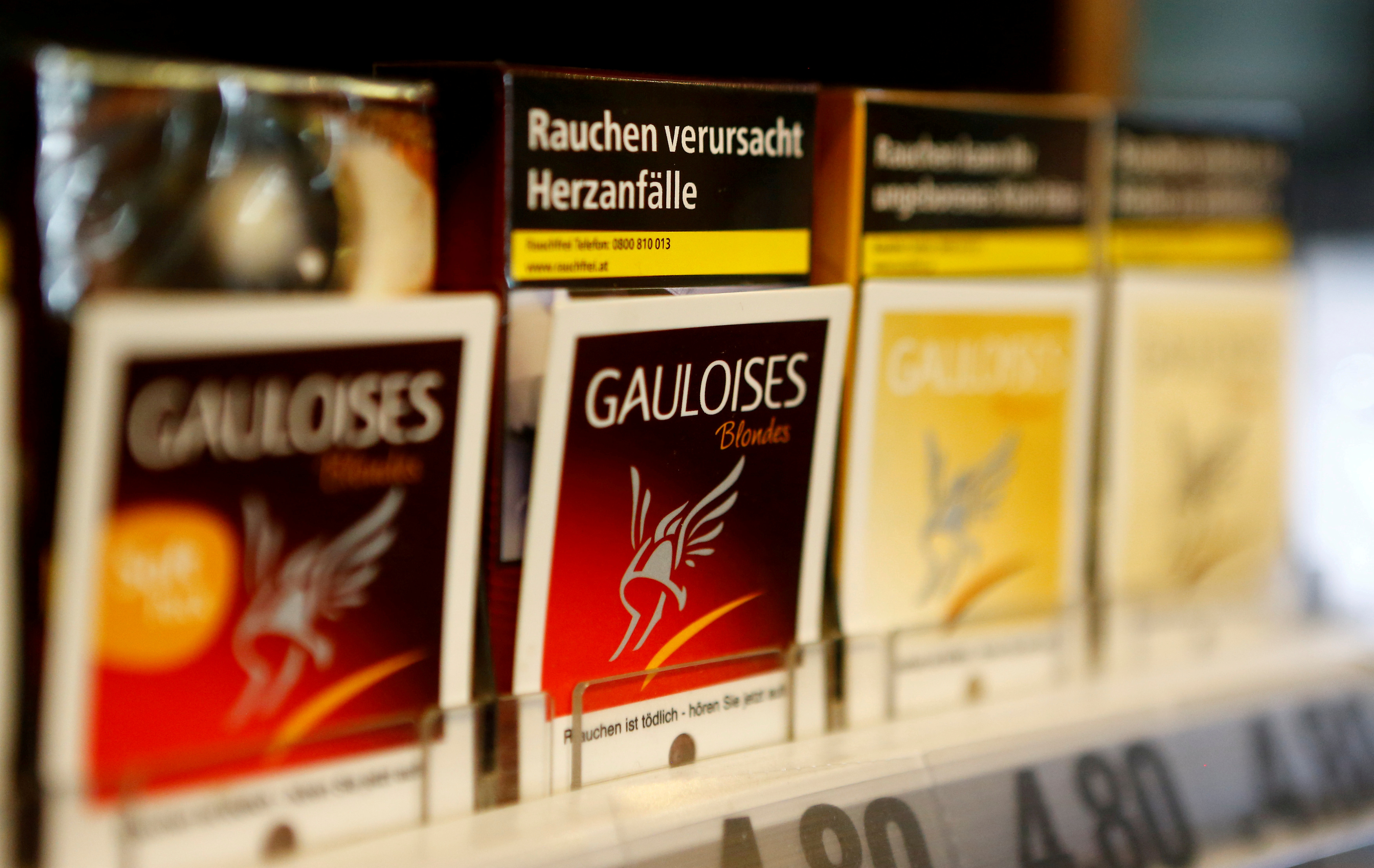 Packs of Gauloises cigarettes are on display in a tobacco shop in Vienna, Austria