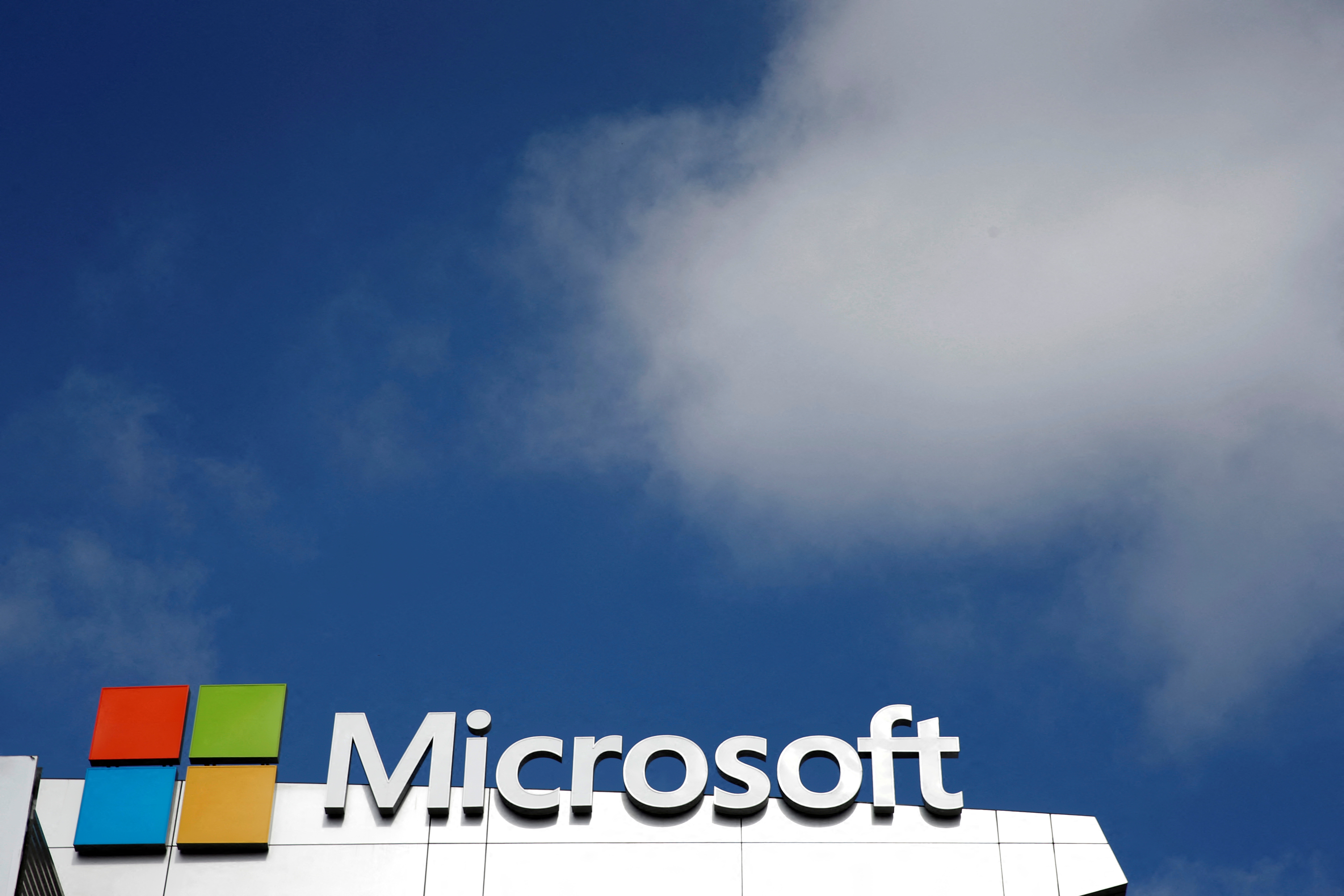 A Microsoft logo is seen next to a cloud in Los Angeles, California, U.S. June 14, 2016.