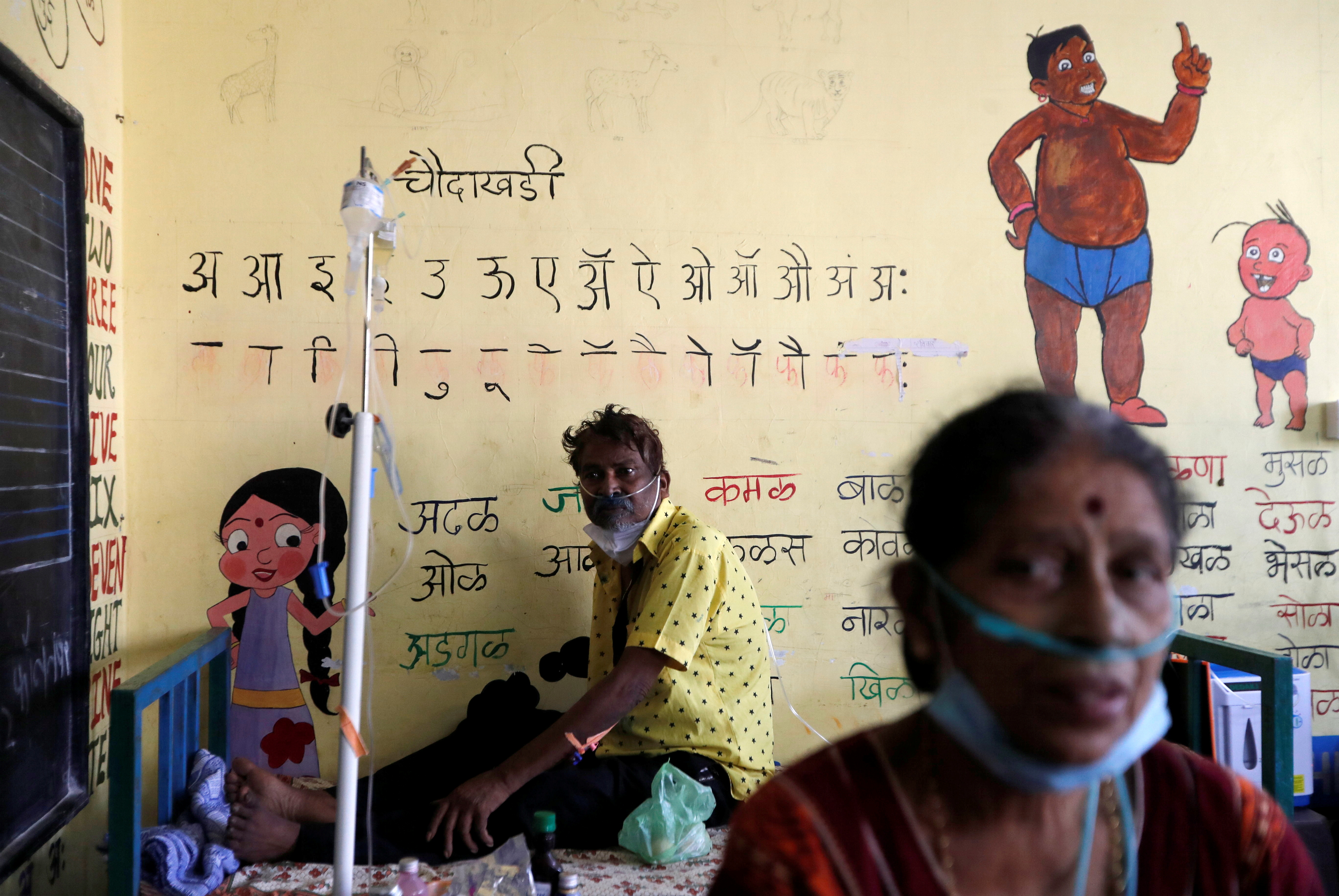 Patients are treated at classroom turned COVID-19 care facility on outskirts of Mumbai