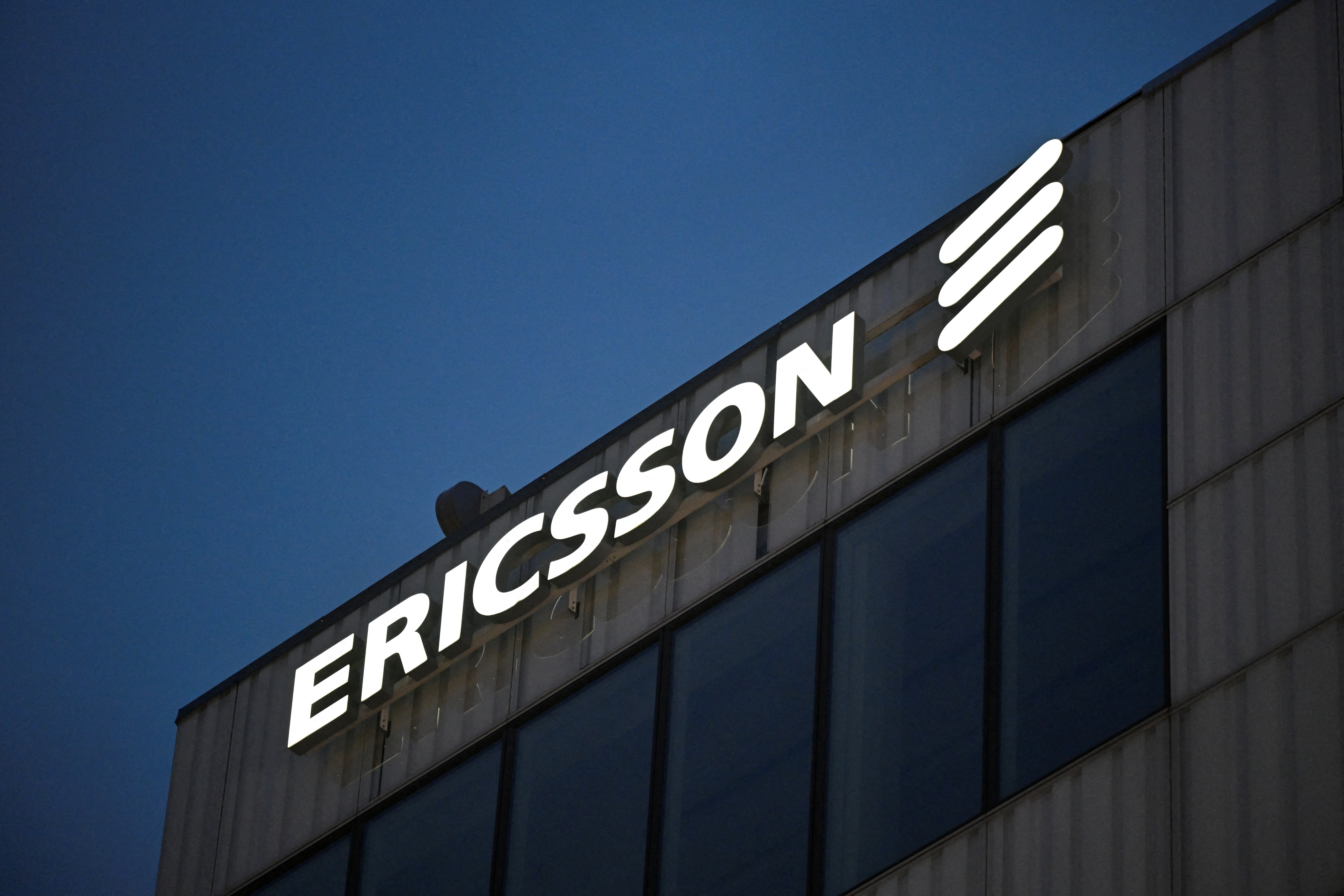 Ericsson logo is displayed on the company's headquarters building in Stockholm