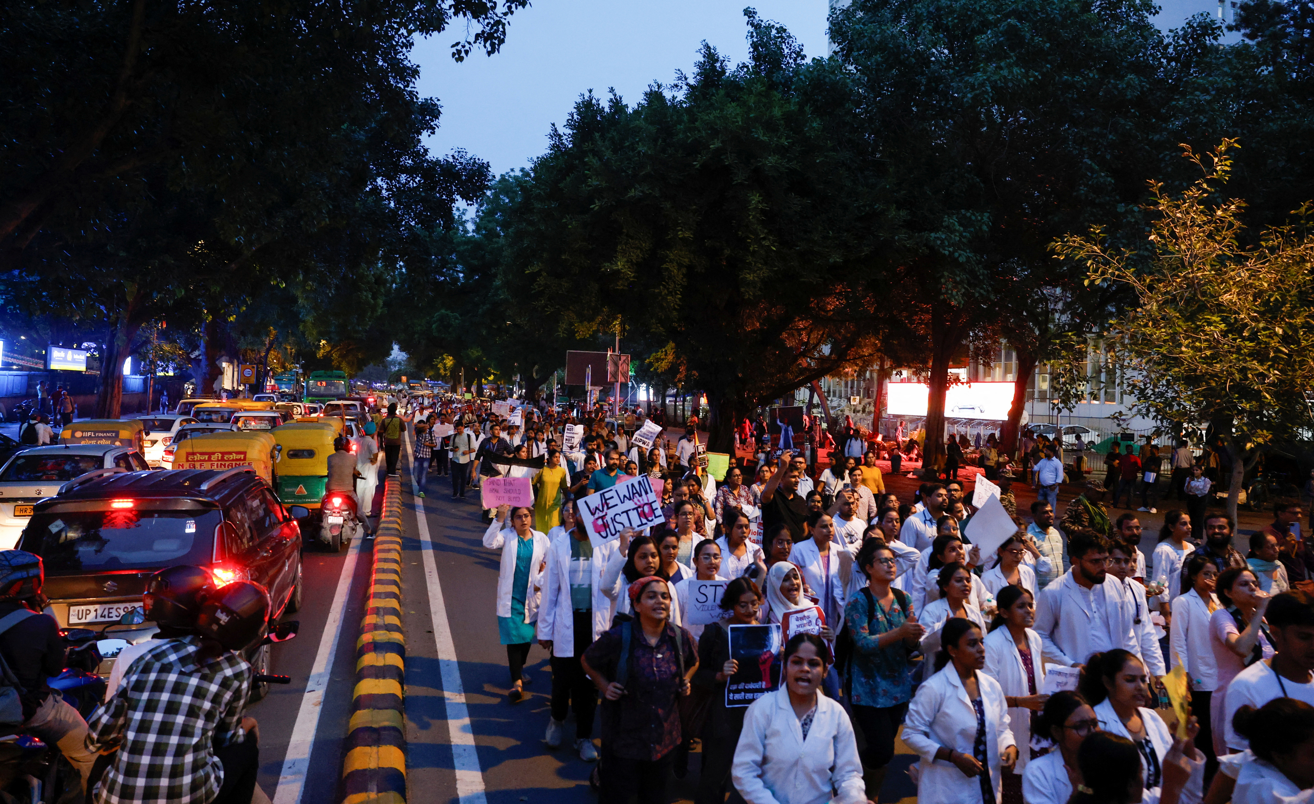 Protest march demanding justice following the rape and murder of a trainee medic at a hospital in Kolkata, in New Delhi