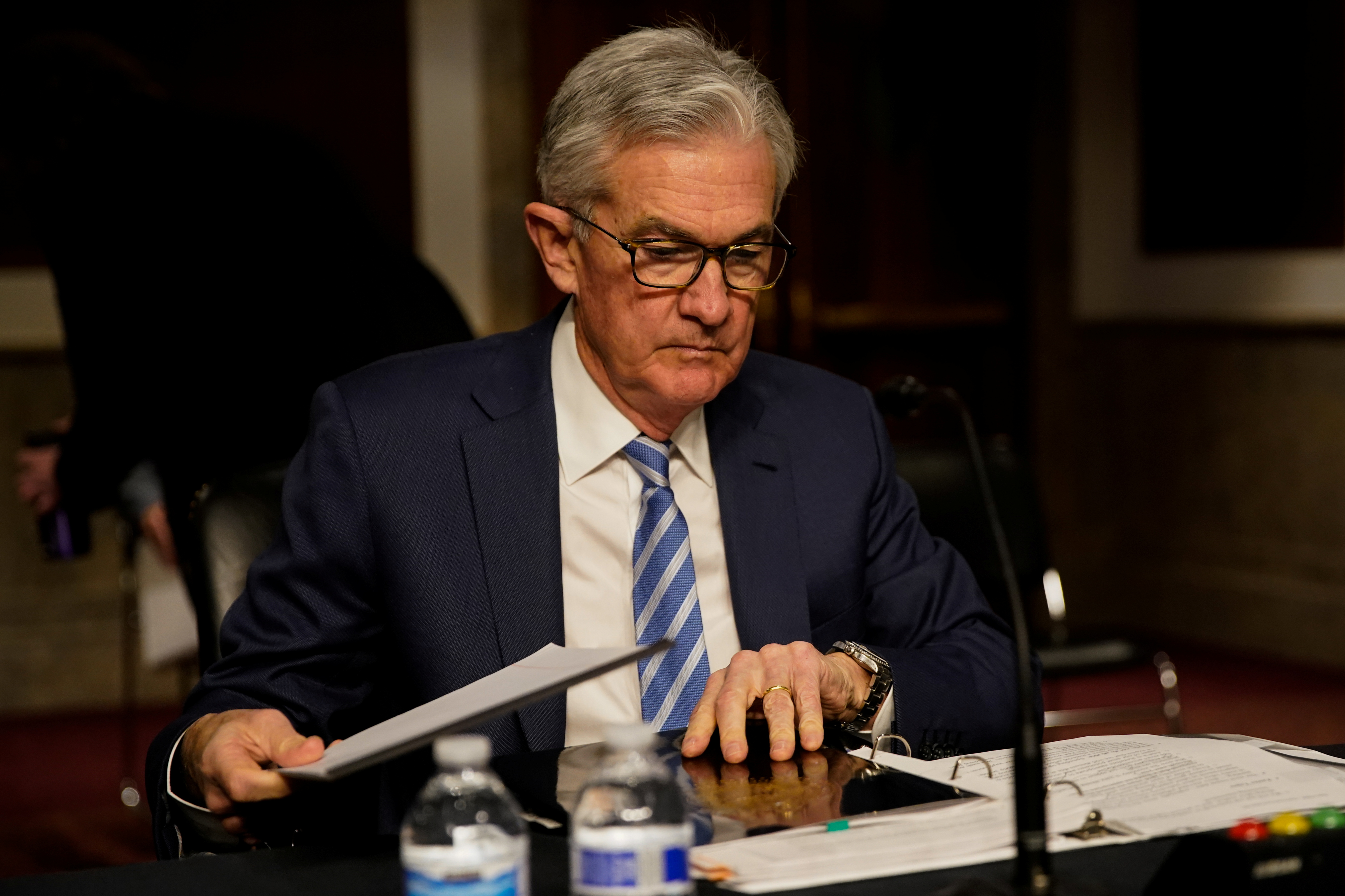 Federal Reserve Chair Jerome Powell prepares to testify before a Senate Banking Committee hybrid hearing on oversight of the Treasury Department and the Federal Reserve on Capitol Hill in Washington, U.S., November 30, 2021. REUTERS/Elizabeth Frantz