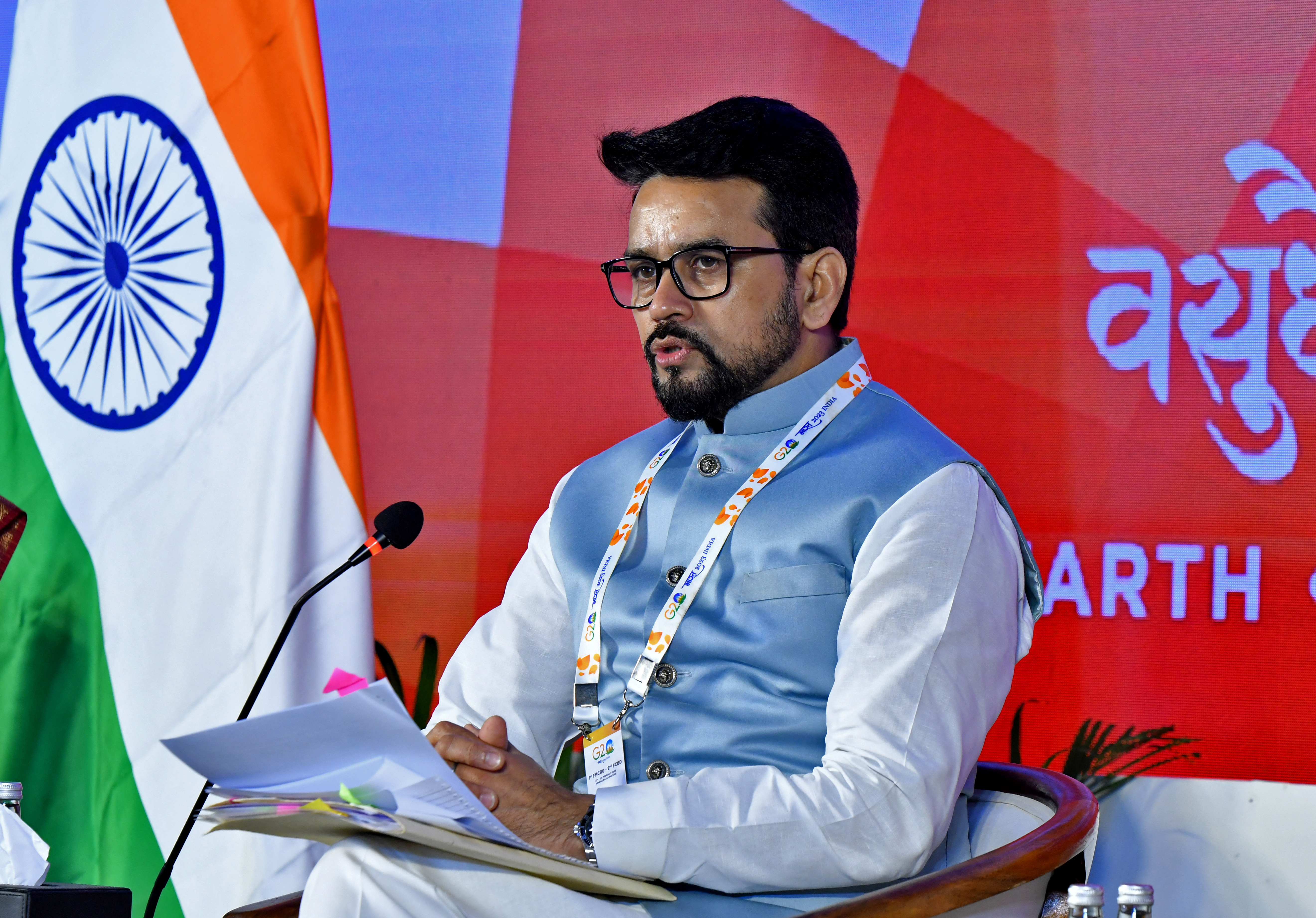 India's Information Minister Anurag Thakur addresses a news conference near Bengaluru