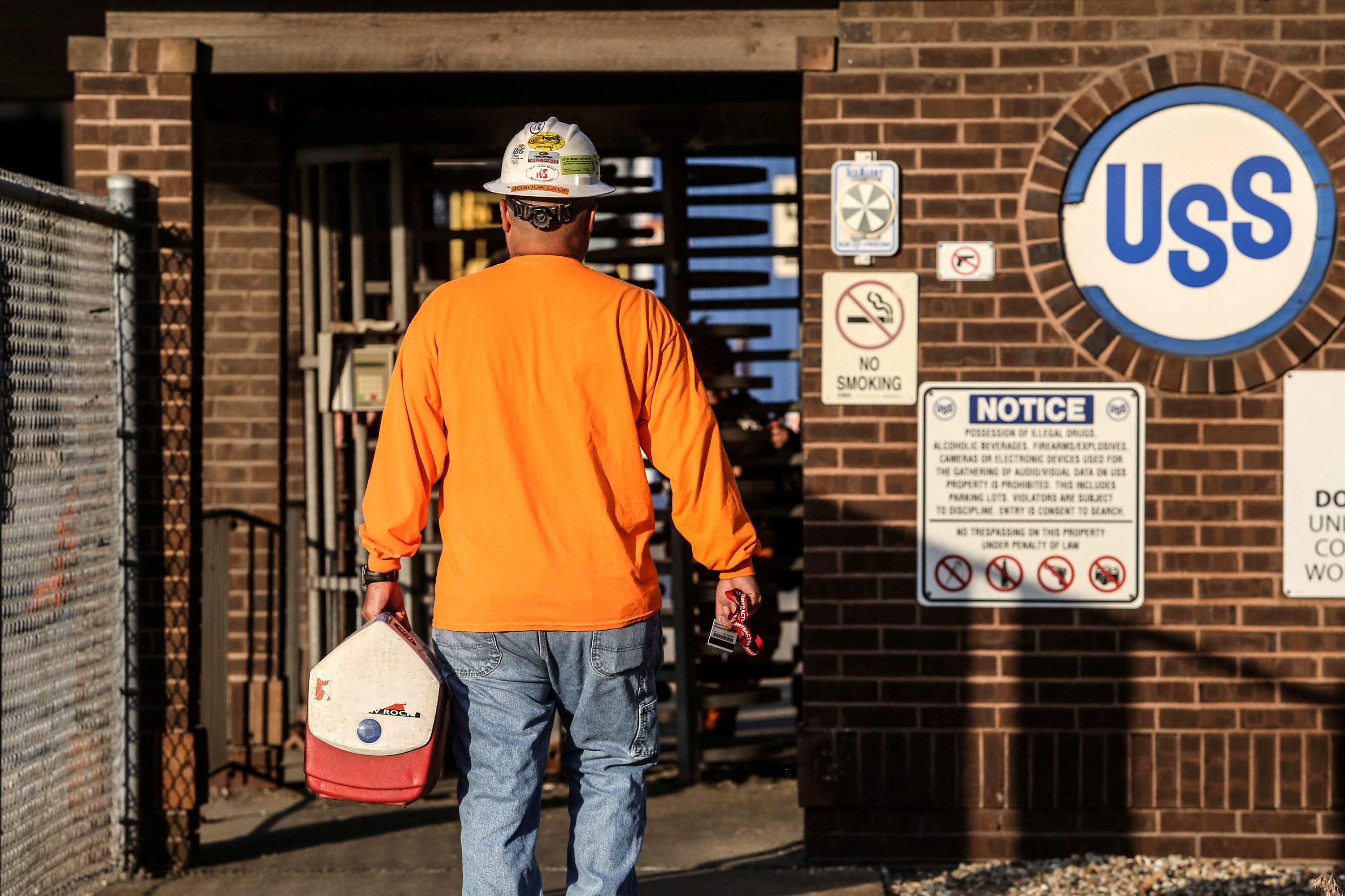 A steel worker returns to U.S. Steel Granite City Works in Granite City