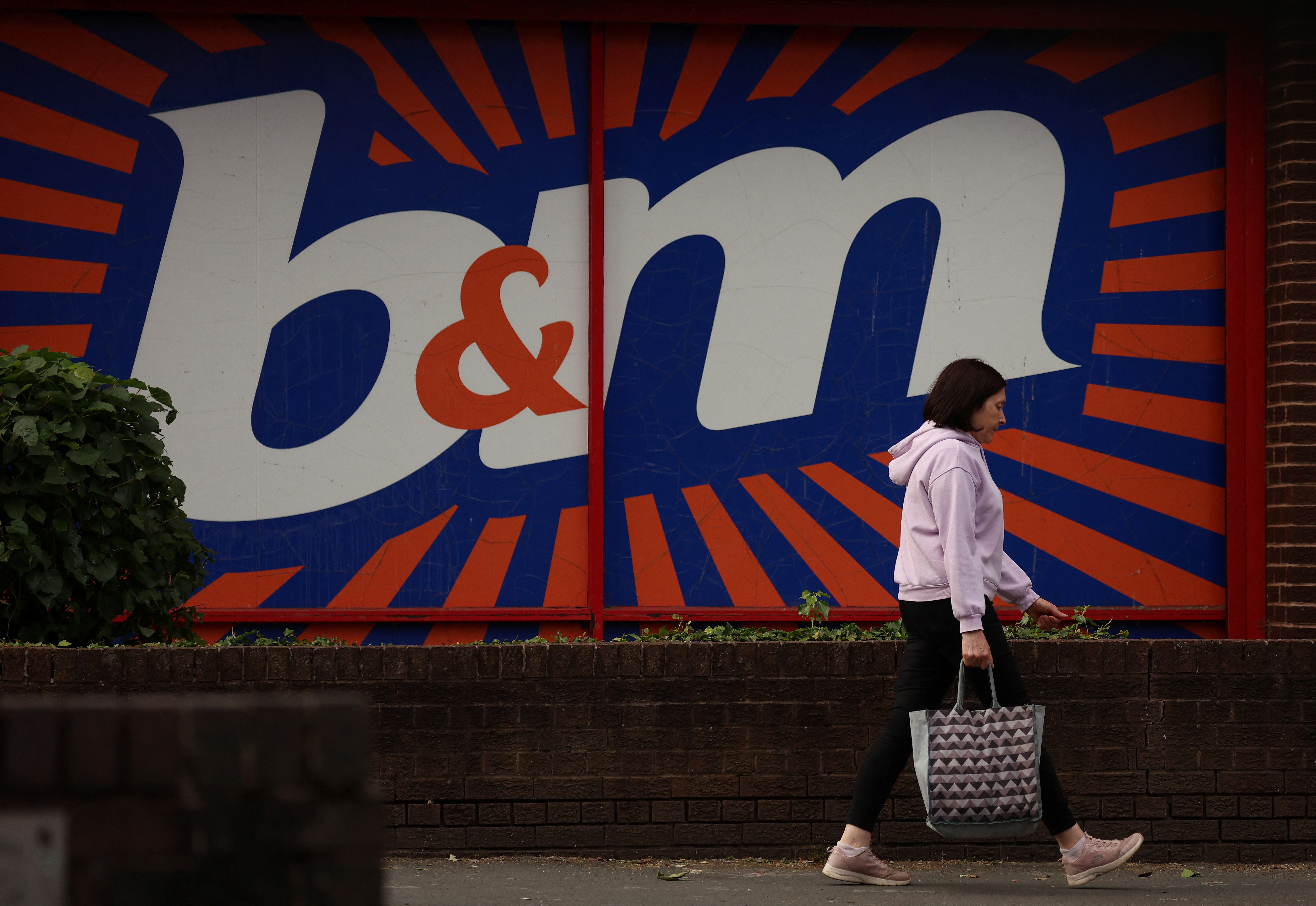 UK discount retailer B&M raises profit outlook but sales growth