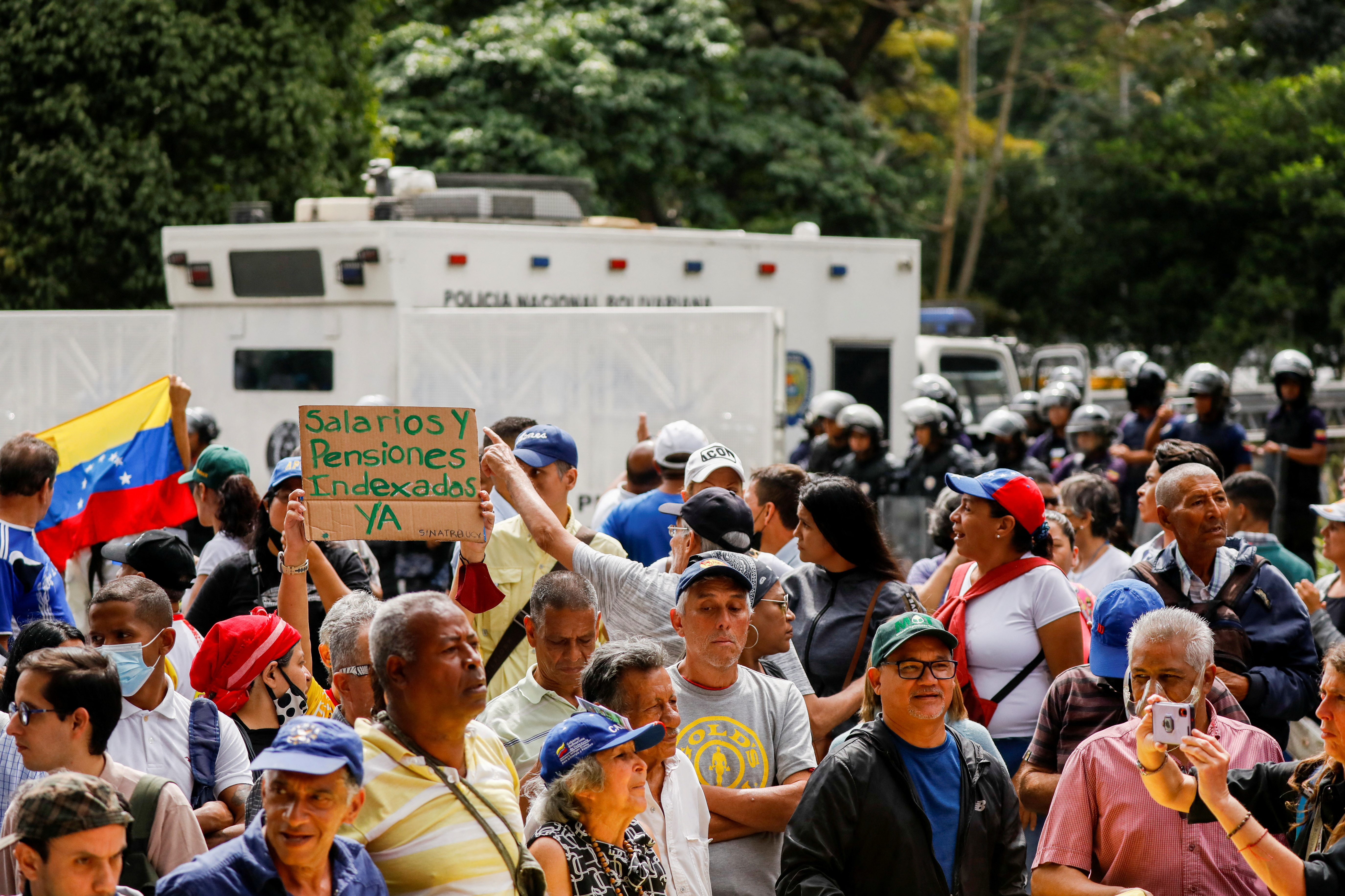 People march in demand of better salaries, in Caracas