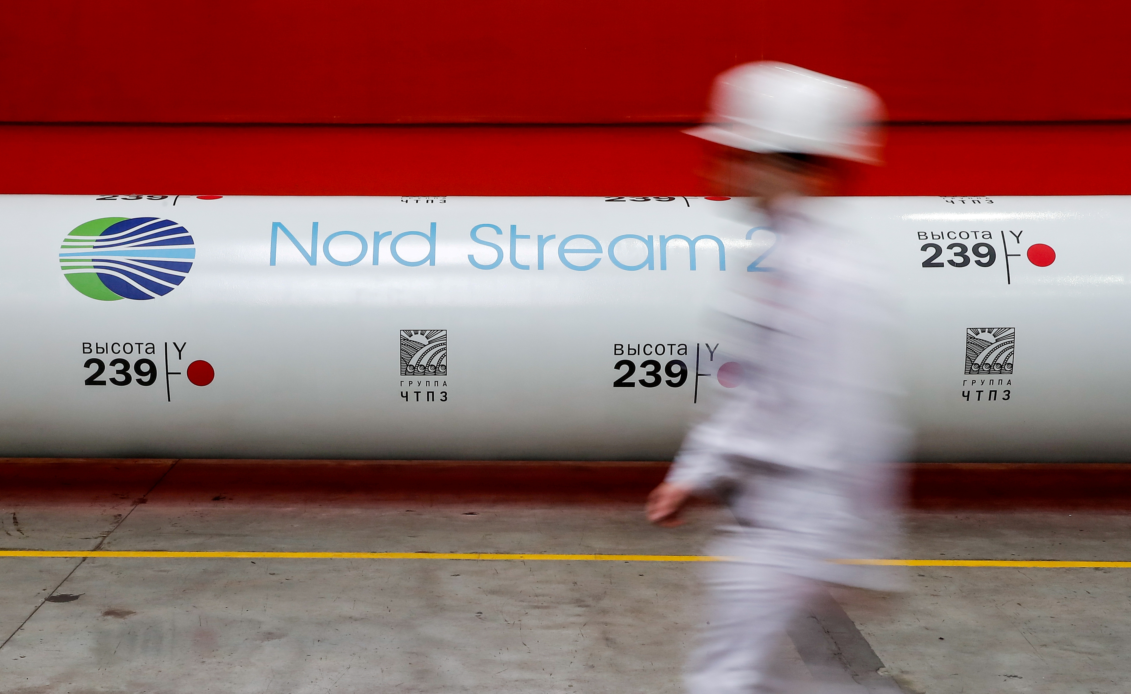 FILE PHOTO: The logo of the Nord Stream 2 gas pipeline project is seen on a pipe at Chelyabinsk pipe rolling plant in Chelyabinsk