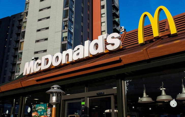 McDonald's company logo is seen on the front of a restaurant in London