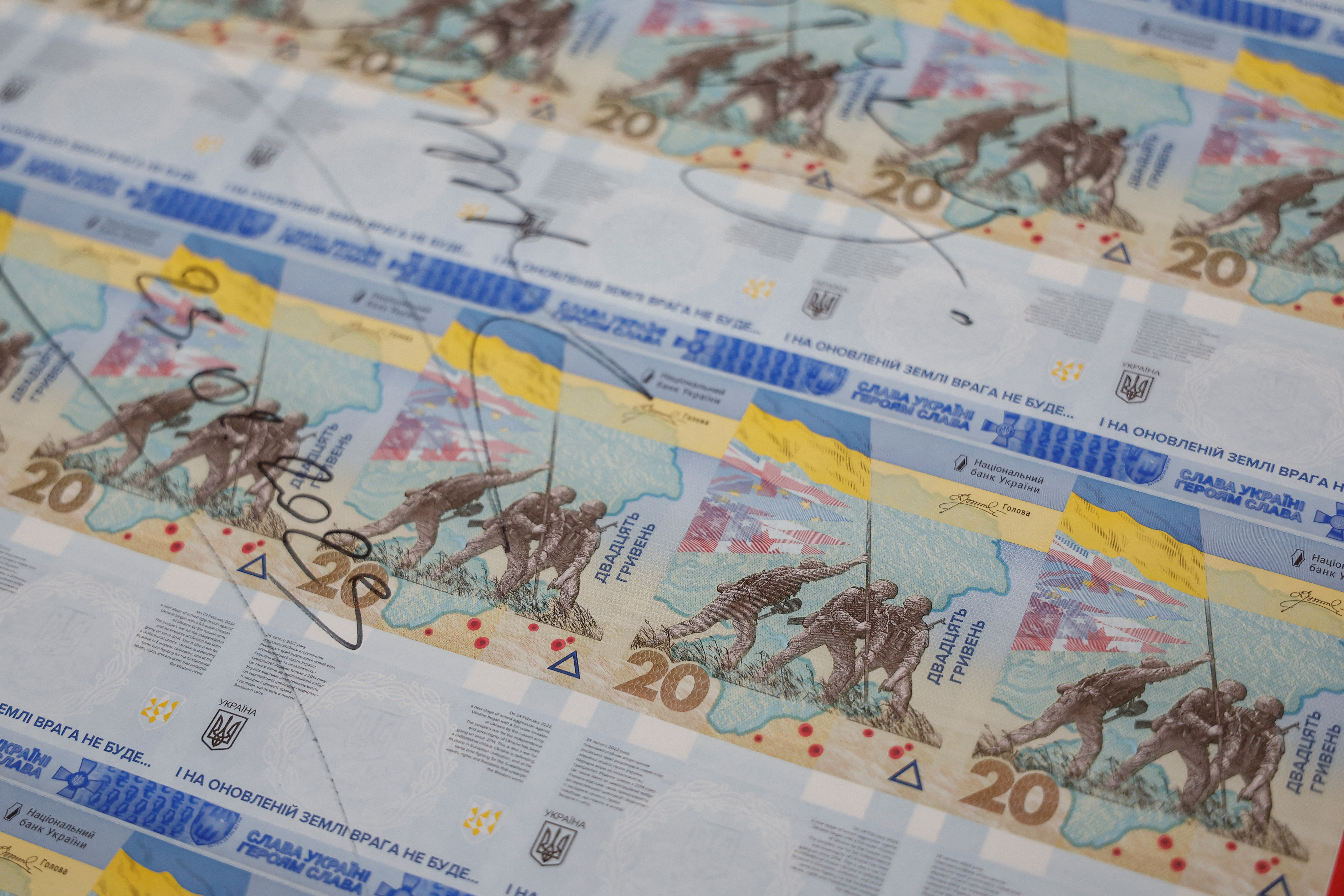Banknotes dedicated to the first anniversary of Russia's invasion on Ukraine are presented in Kyiv