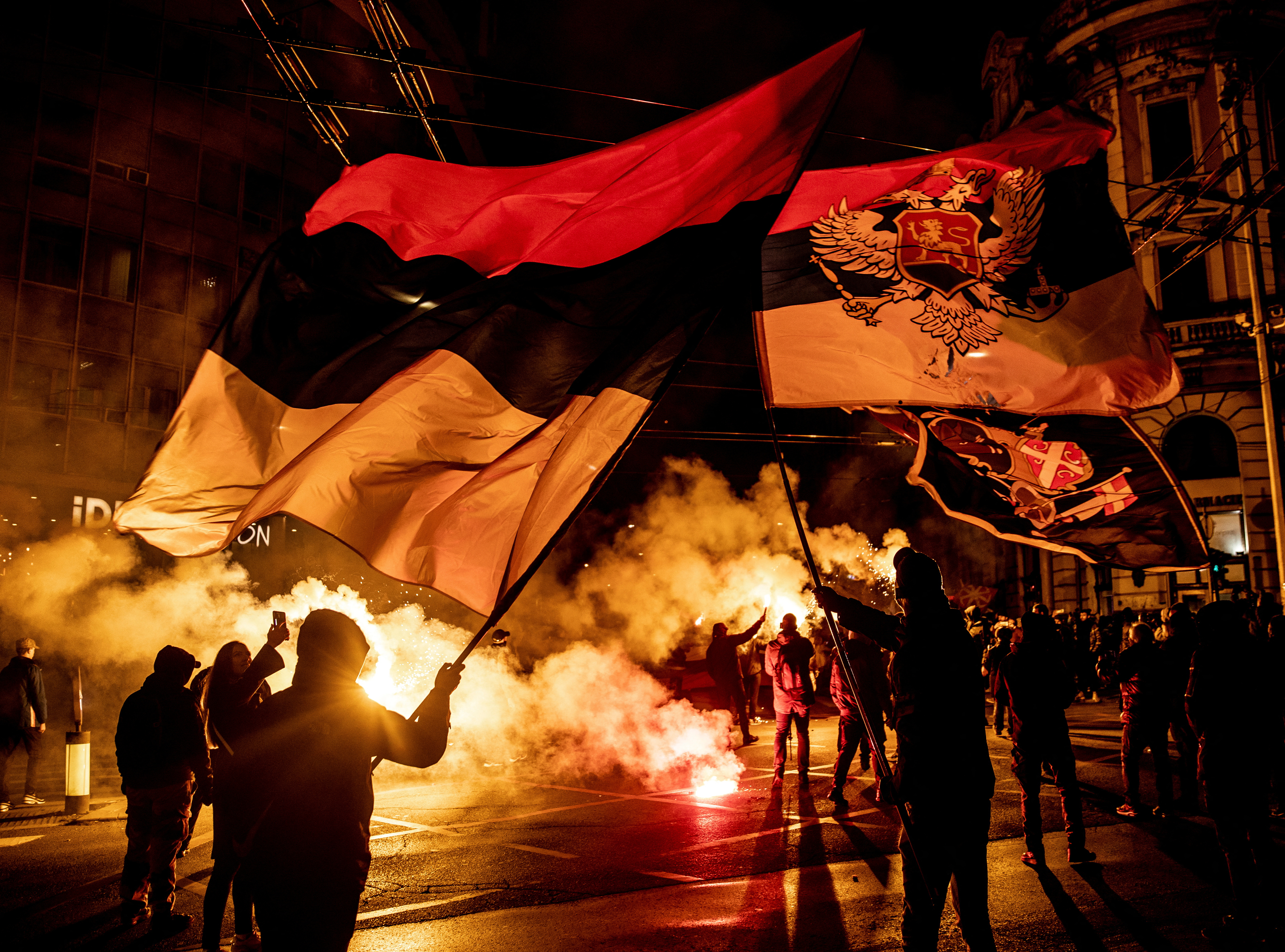 Pro-Russia protestors march through the streets in central Belgrade