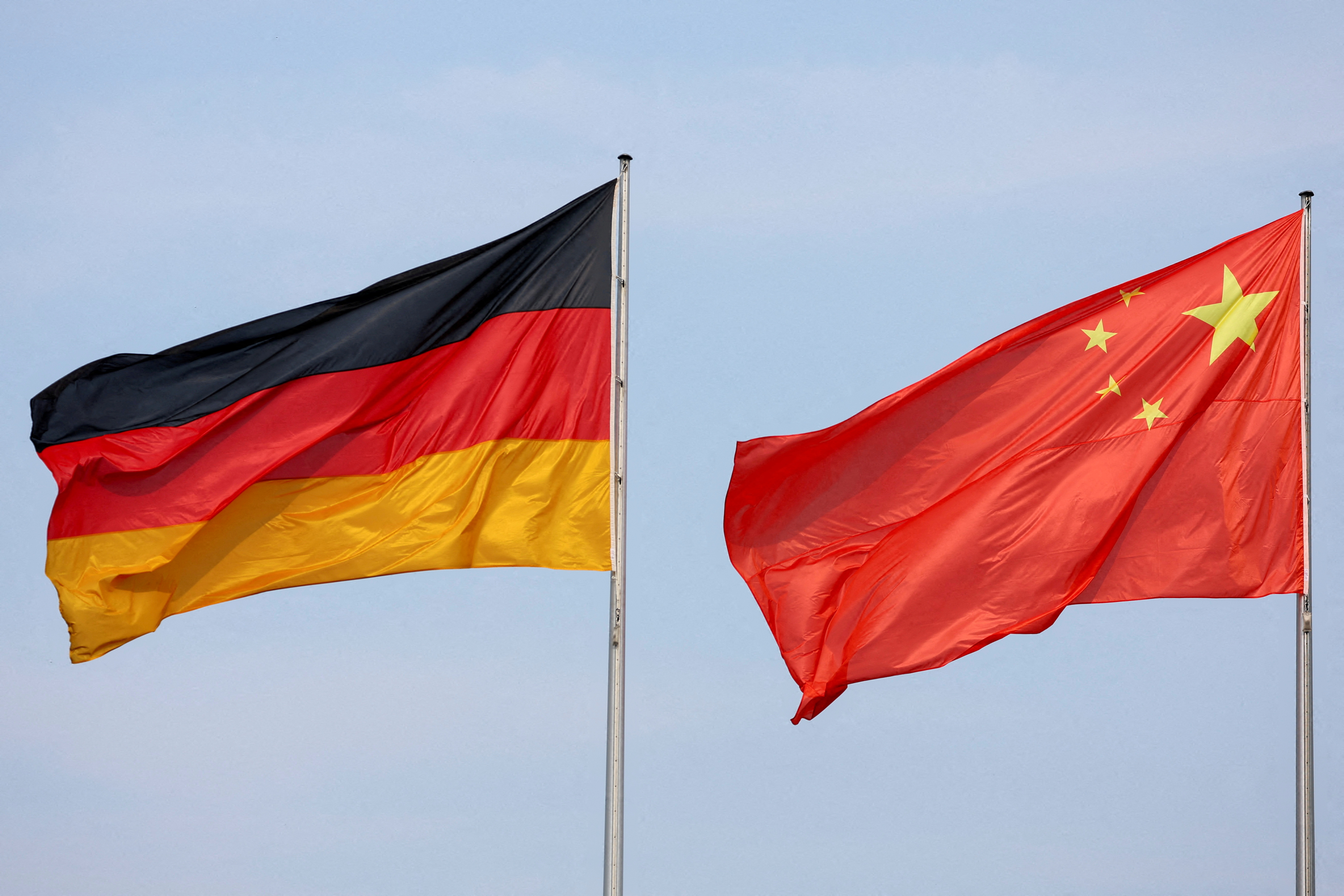 The flags of Germany and China are seen in Berlin, Germany