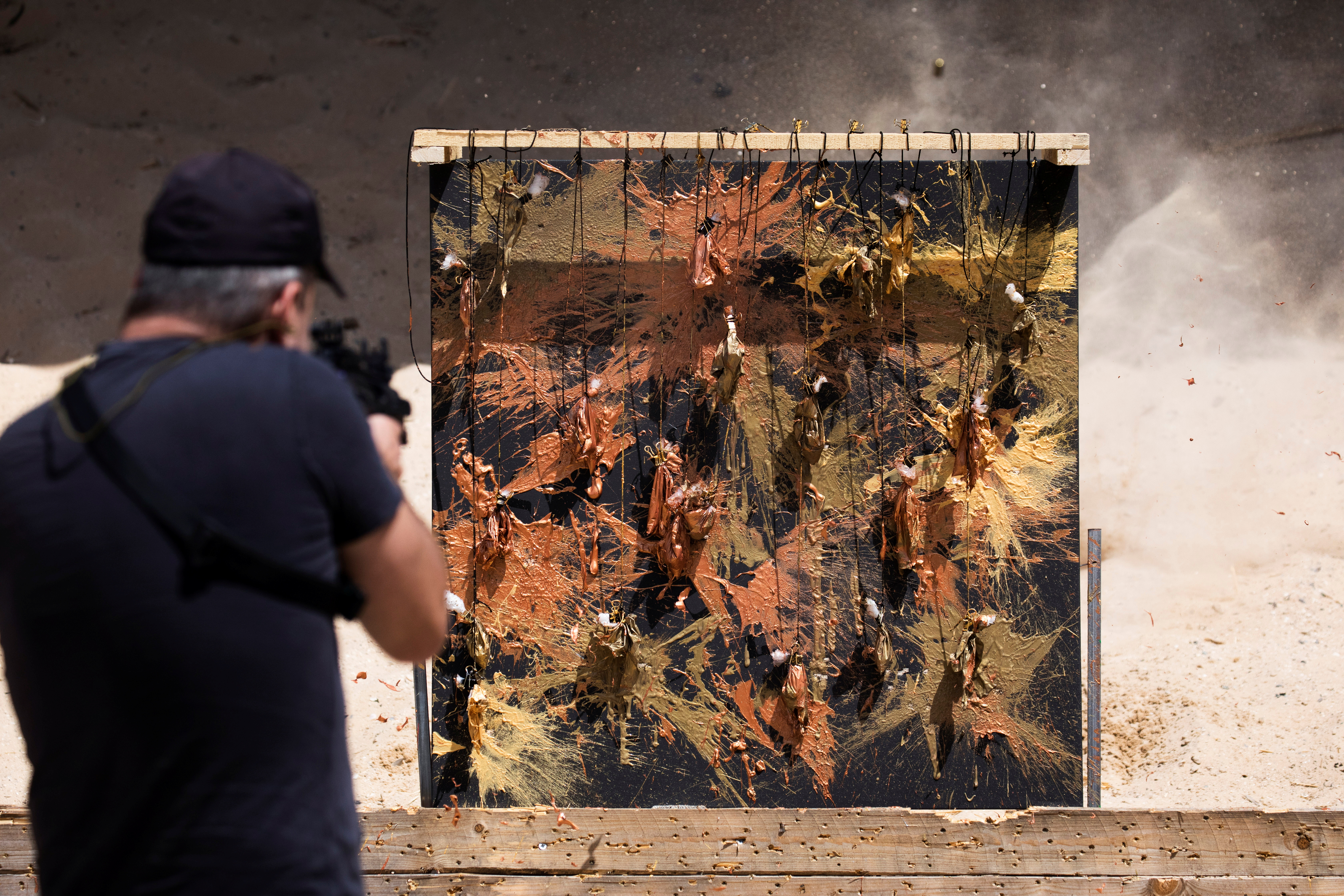 Art attack: Israeli ex-sniper blasts paint in mental-health message