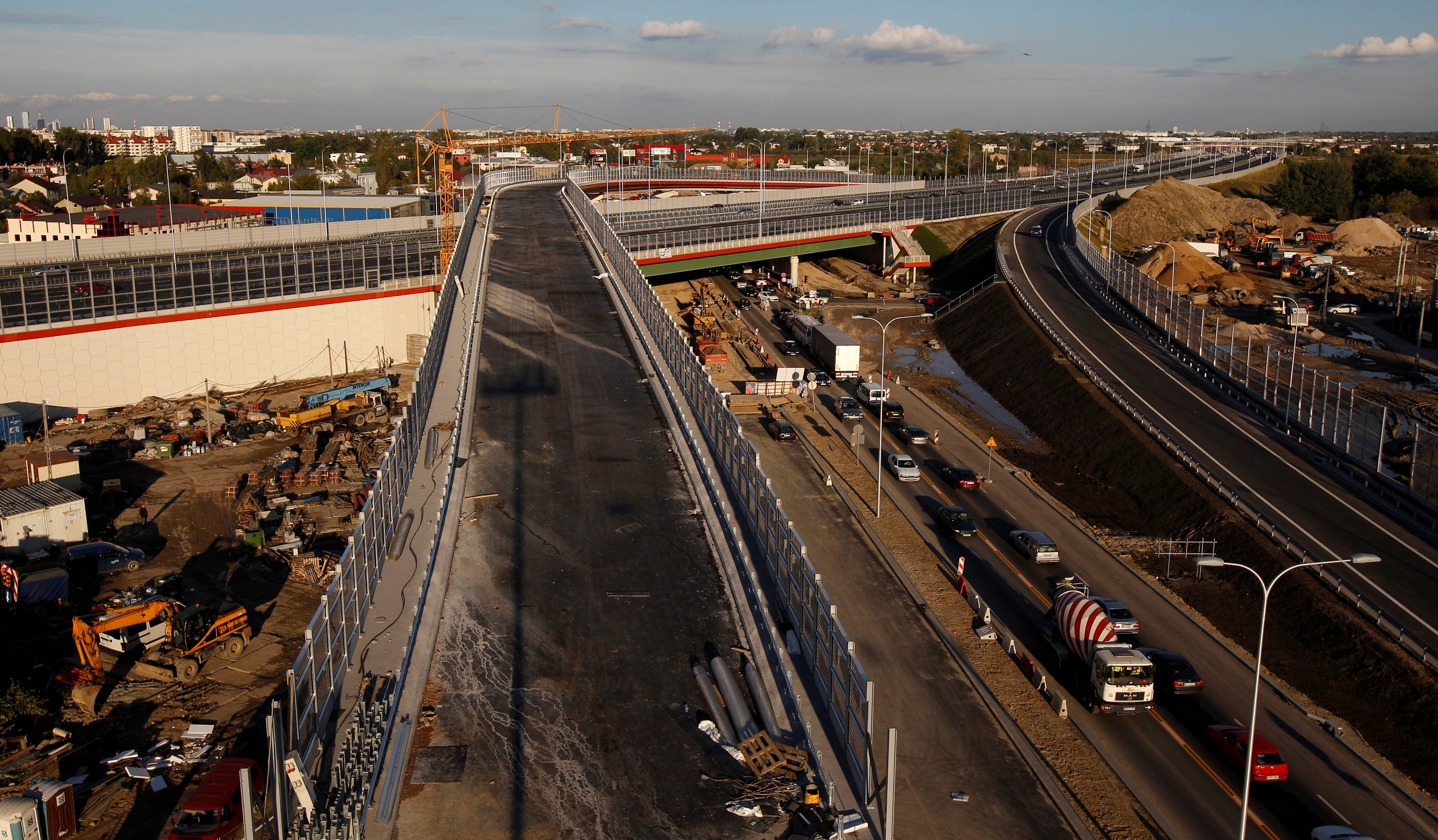 A construction site near a newly-opened portion of a ring road is seen in Warsaw city