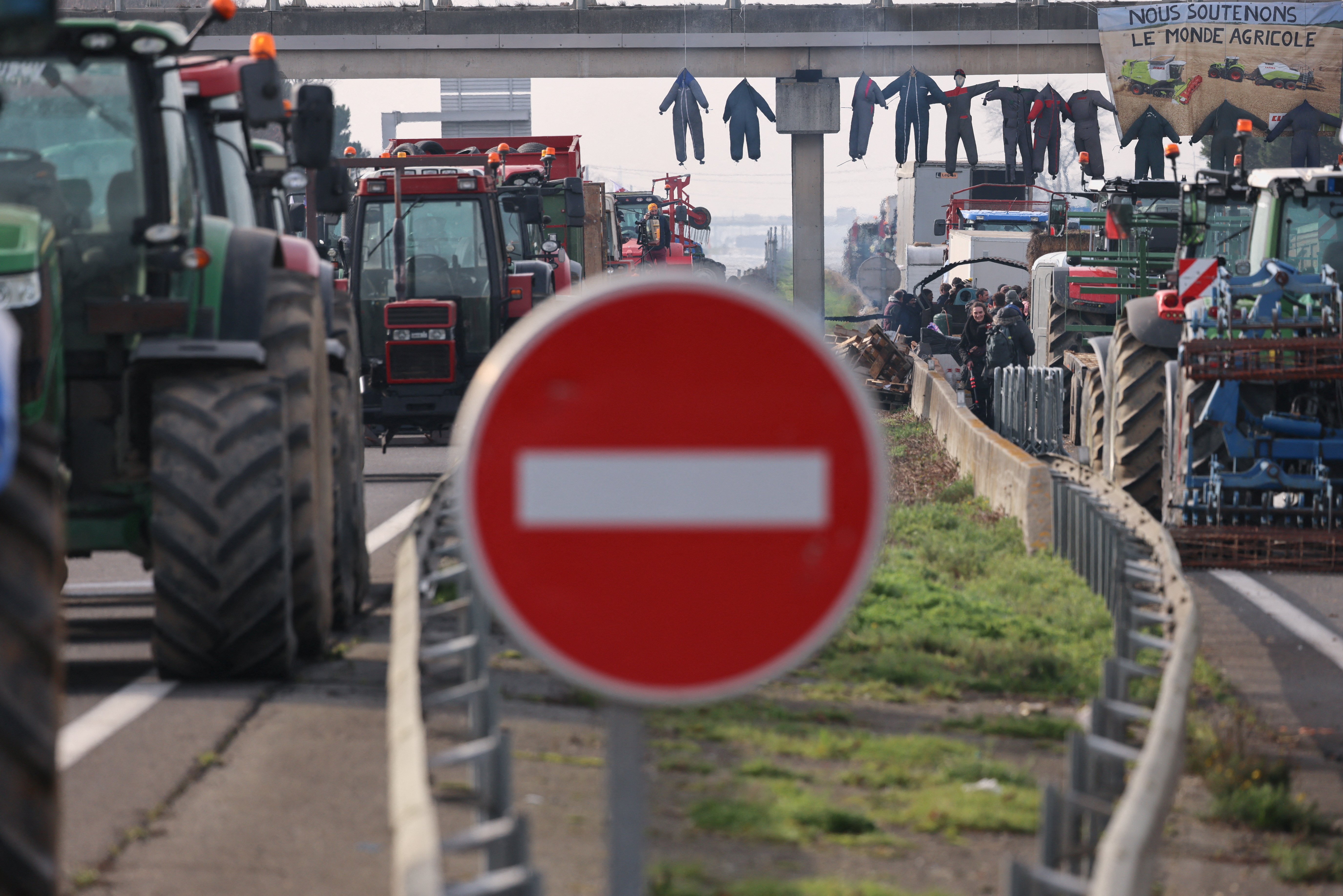 French farmers block road linking France and Spain Reuters