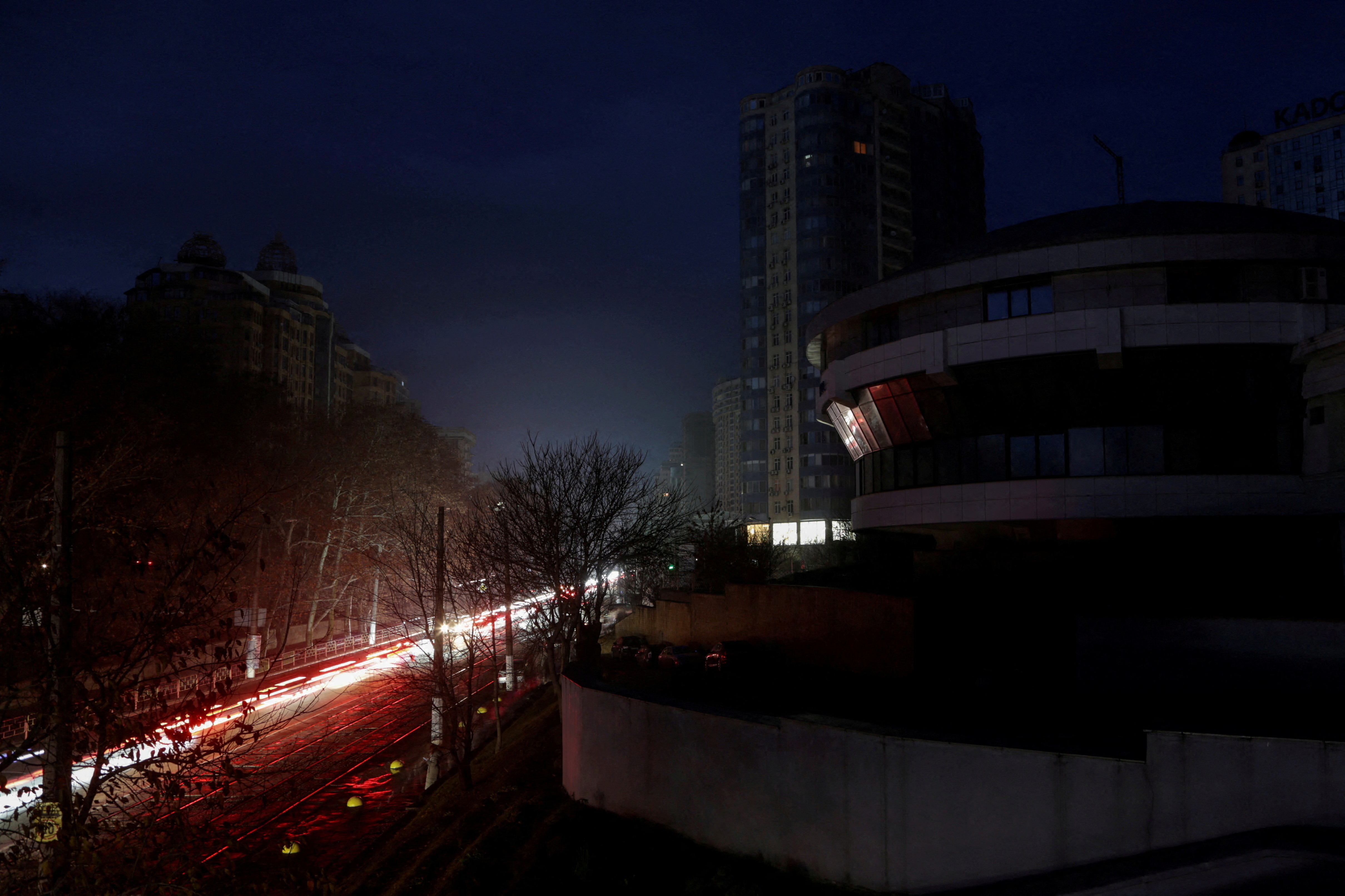 View shows apartment buildings without electricity during a power outage in Odesa