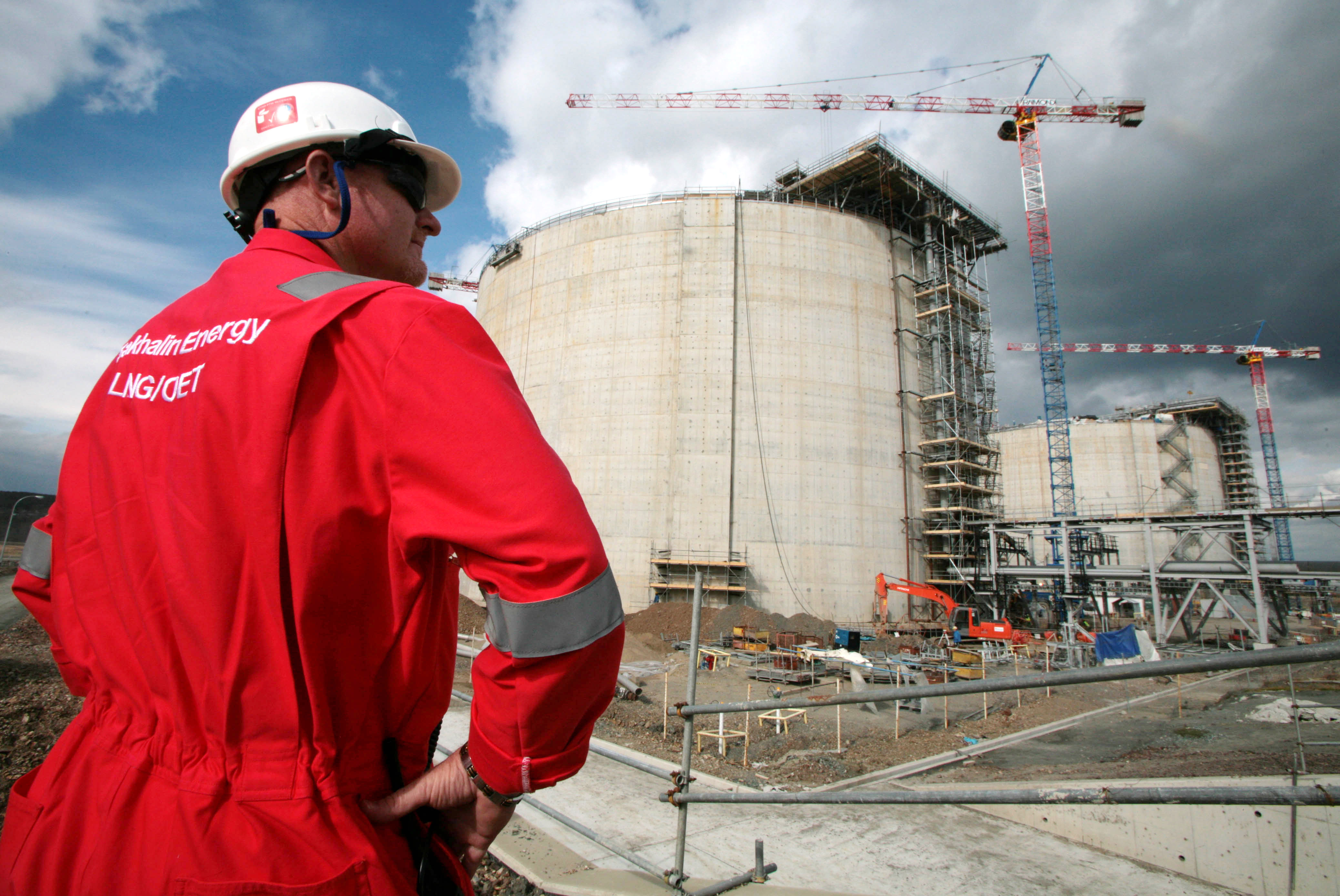 An employee of Sakhalin Energy stands at the Sakhalin-2 project's liquefaction gas plant in Prigorodnoye