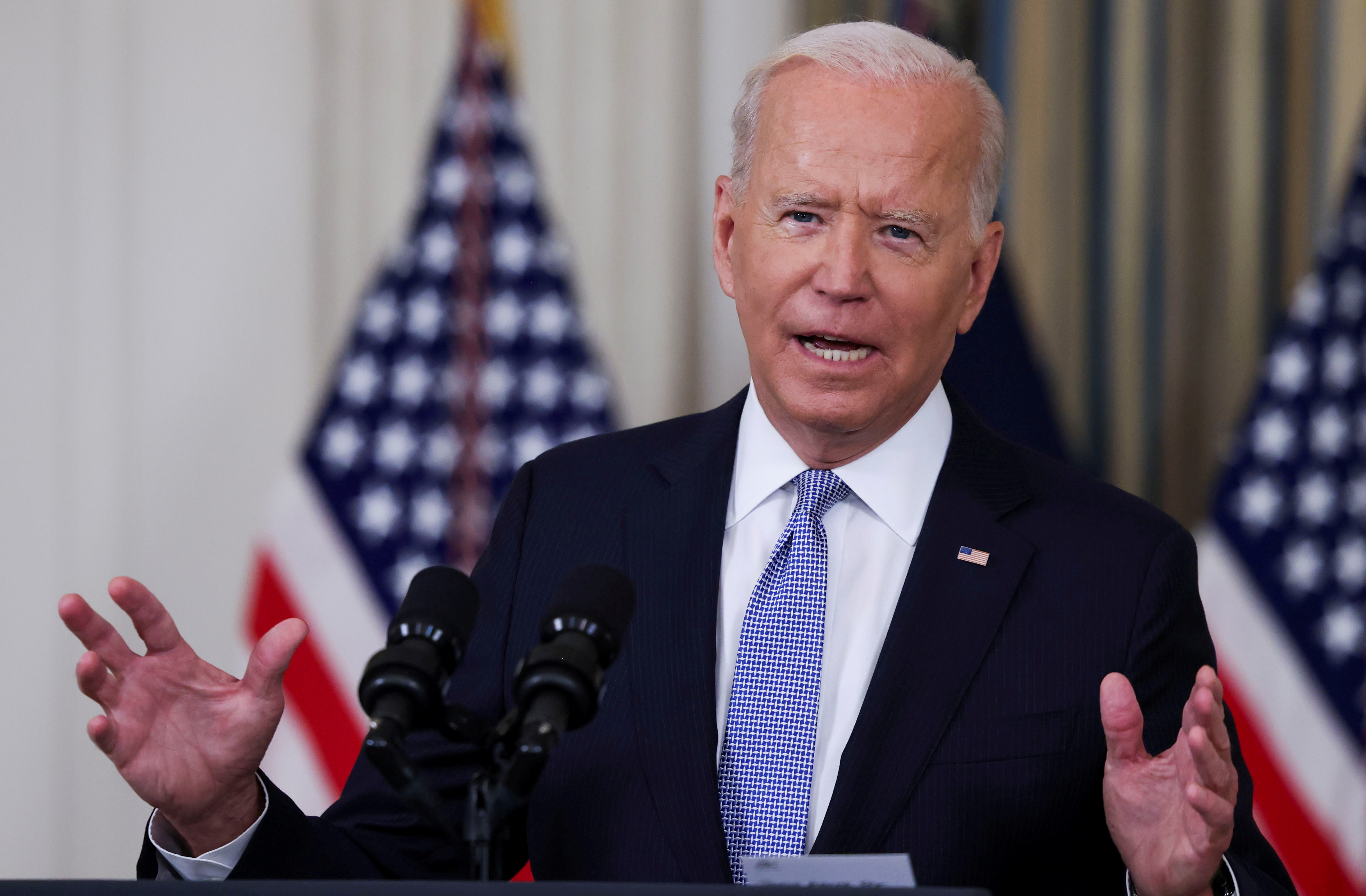 U.S. President Joe Biden responds to a question from a reporter after speaking about coronavirus disease (COVID-19) vaccines and booster shots in the State Dining Room at the White House in Washington, U.S., September 24, 2021. REUTERS/Evelyn Hockstein