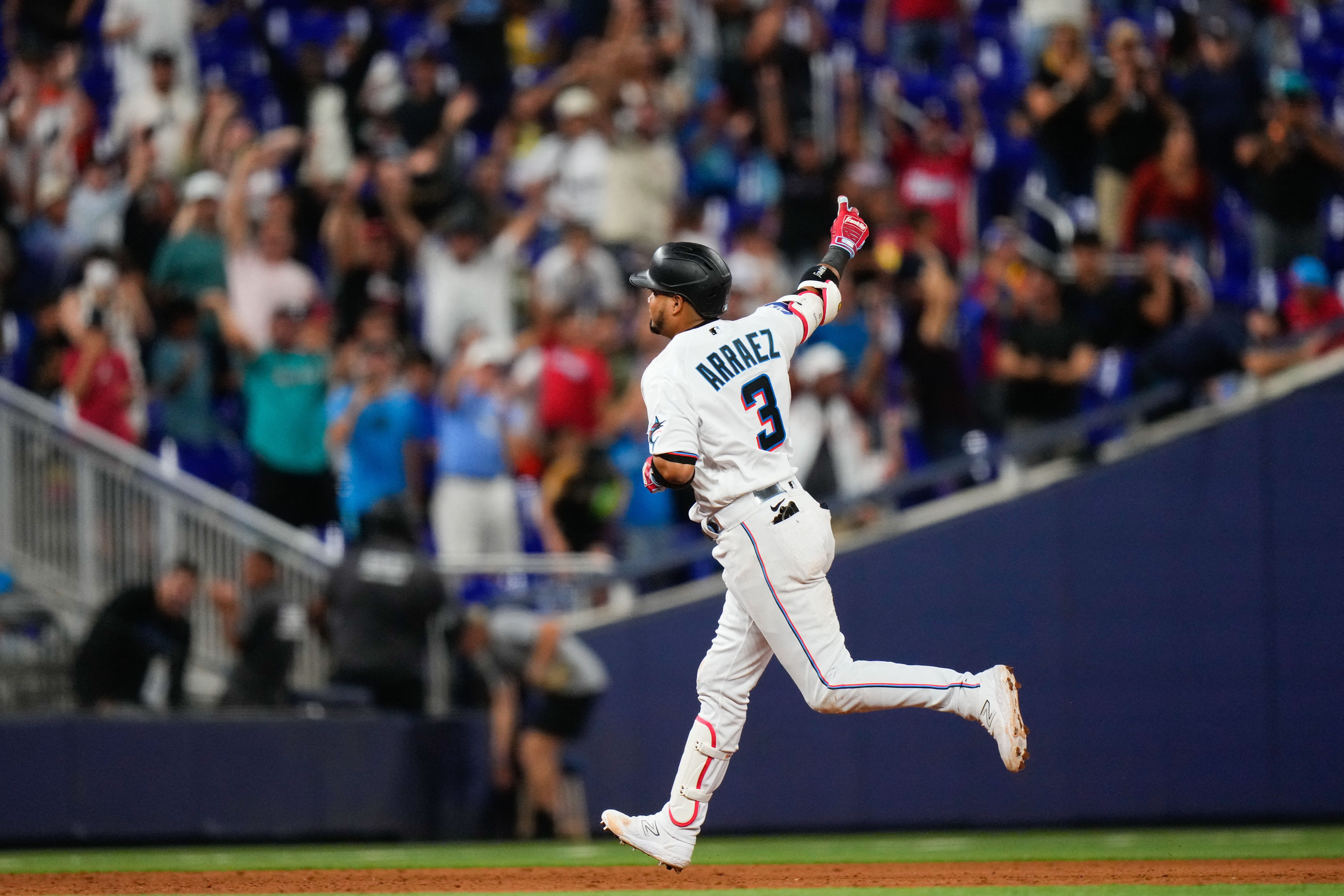 Early trio of homers leads Astros to rout of Marlins