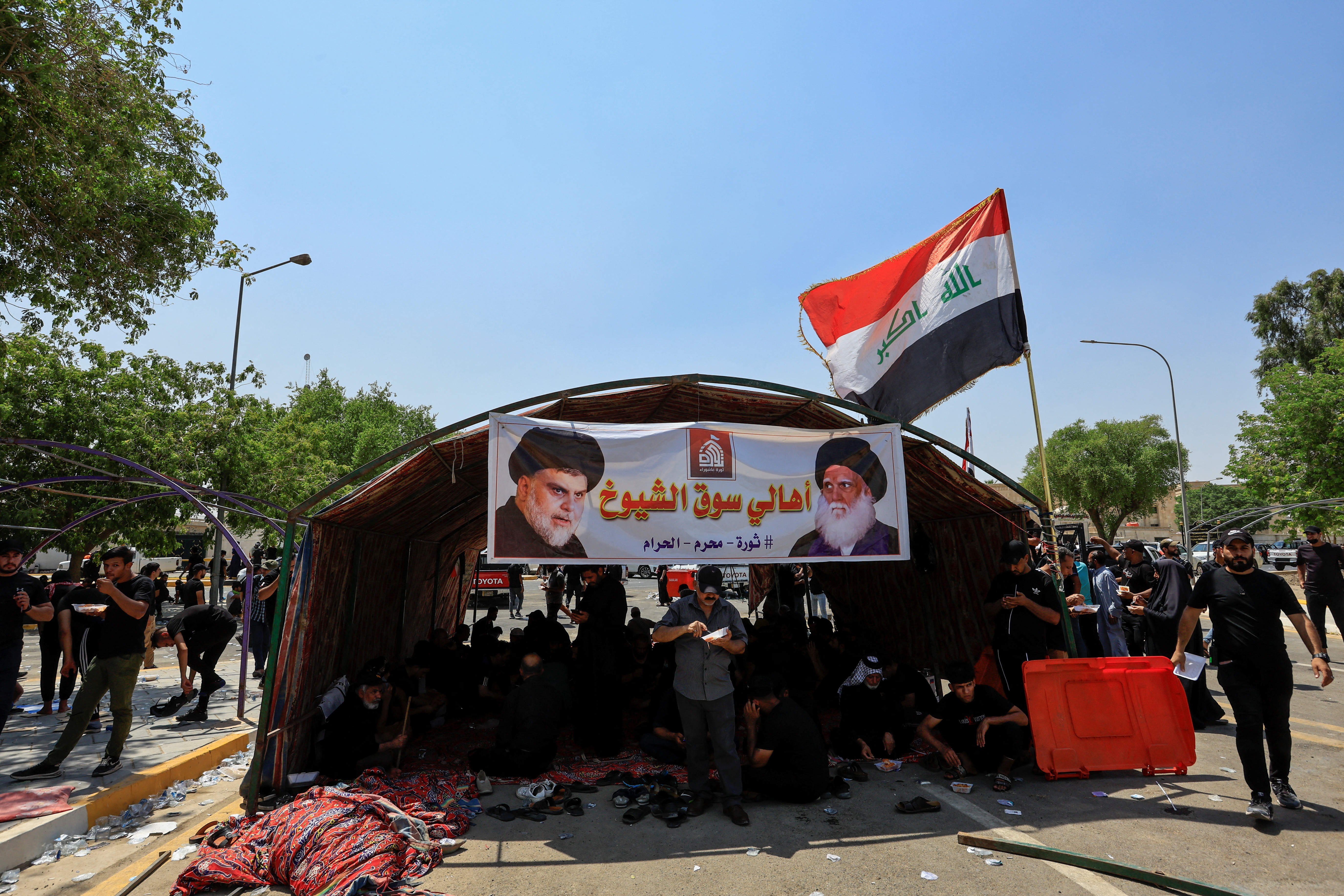 Supporters of Iraqi populist leader Moqtada al-Sadr gather for a sit-in in front of the gate of Supreme Judicial Council of Iraq in Baghdad