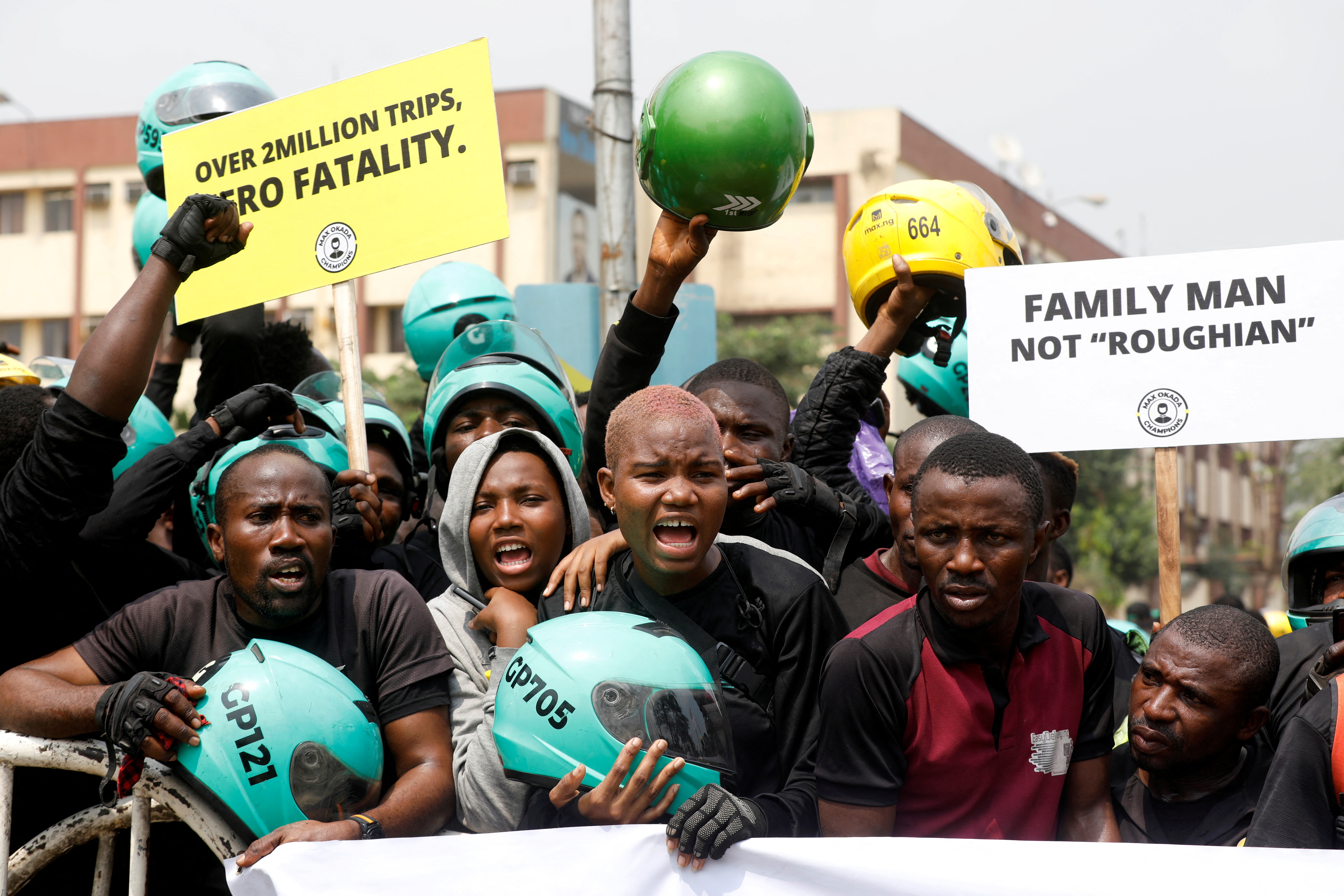 Members of the Transportation Hailing Alliance of Nigeria protest in front of the Lagos State House against the ban of commercial motorcycles in Lagos