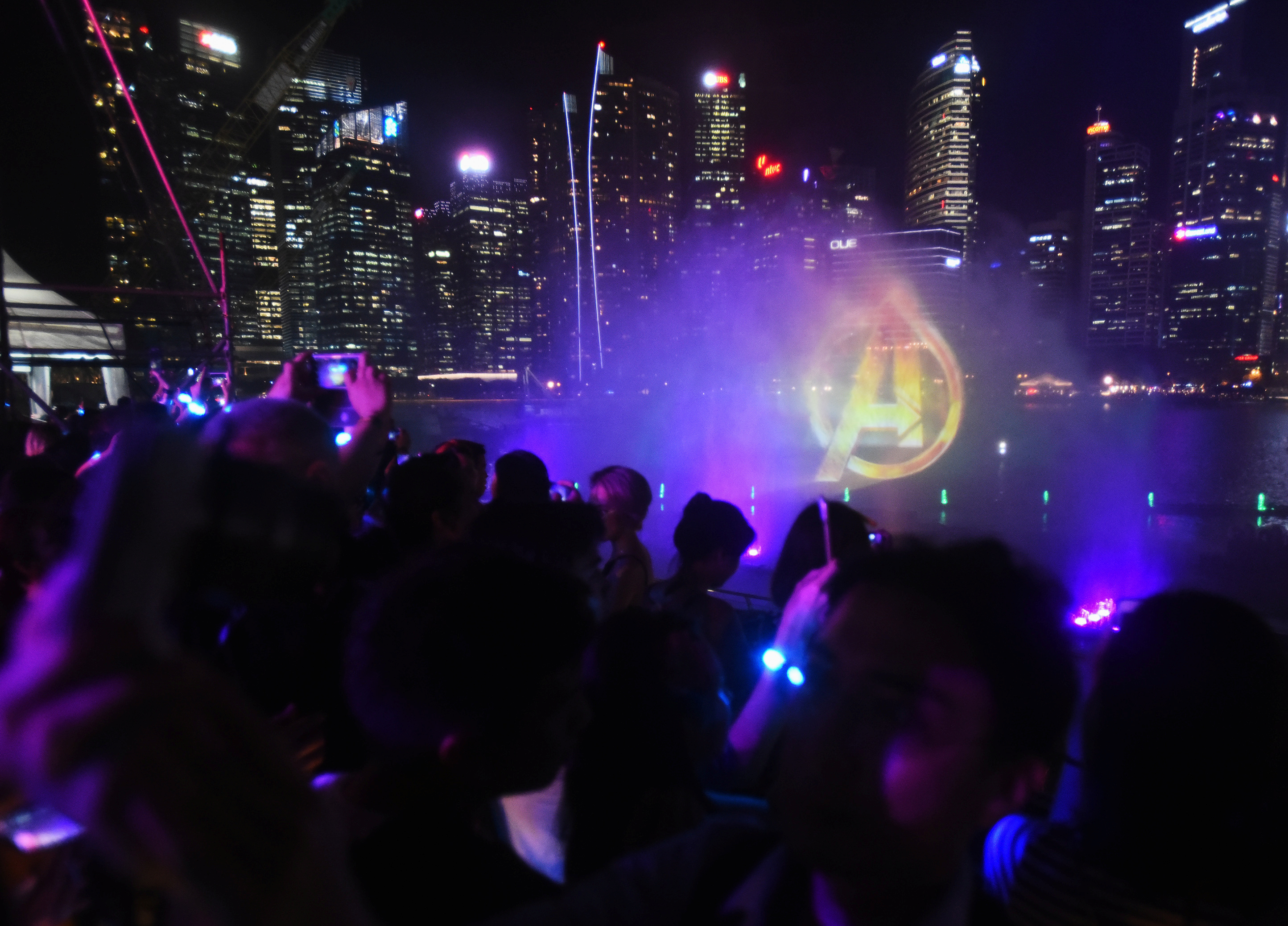 The Avengers logo is projected with the Singapore CBD skyline in the background, at a fan event for Marvel Studio's Avengers: Infinity War movie, in Singapore