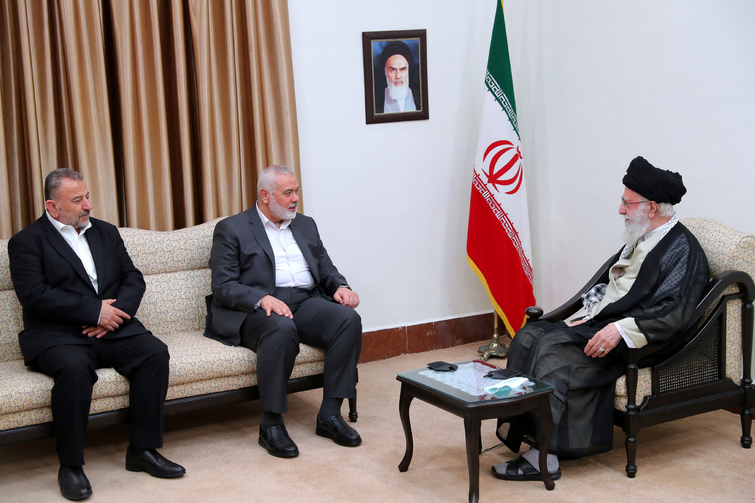 Iran's Supreme Leader Ayatollah Ali Khamenei meets with Palestinian group Hamas' top leader, Ismail Haniyeh, in Tehran