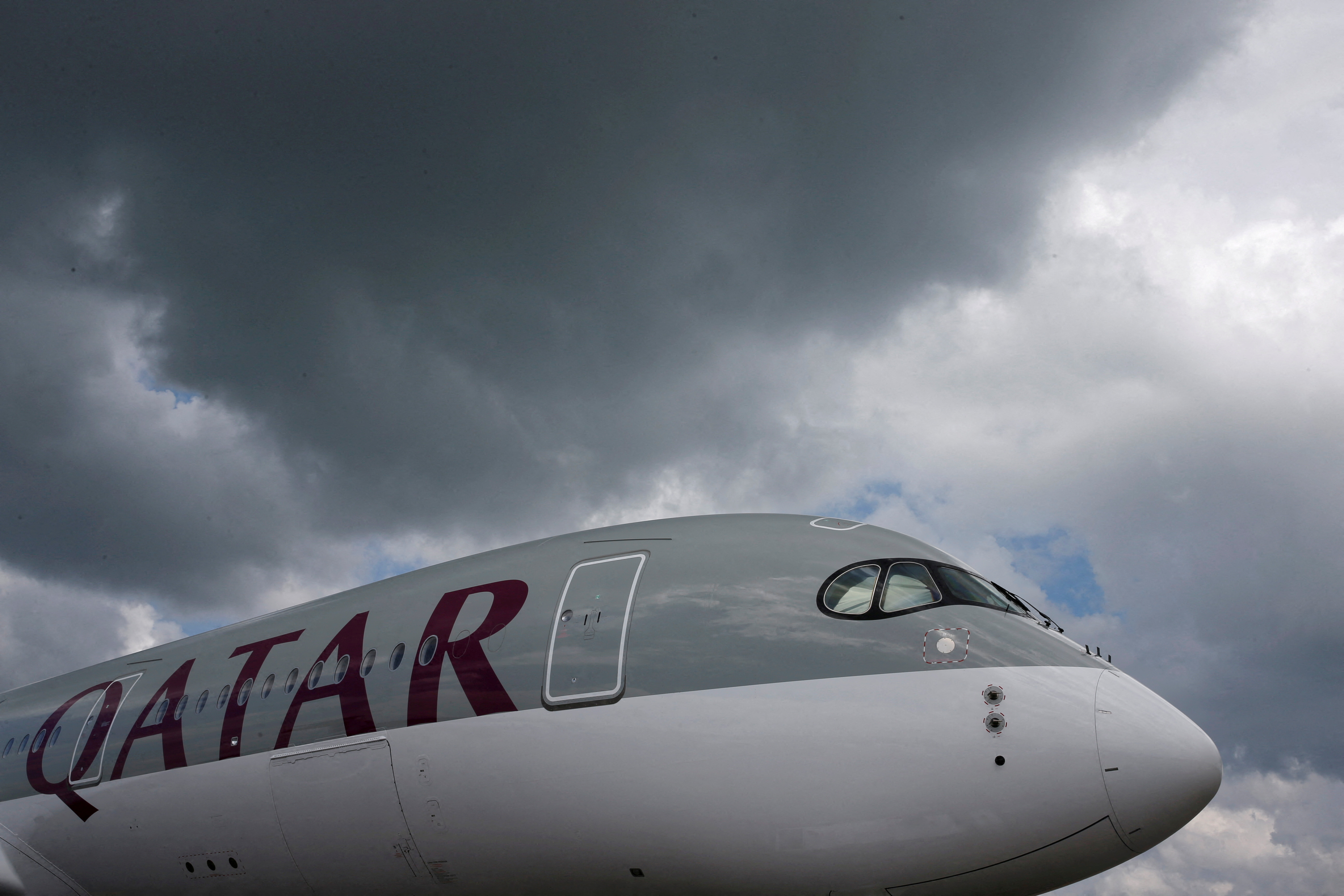 A Qatar Airways Airbus A350 XWB aircraft is displayed at the Singapore Airshow at Changi Exhibition Center