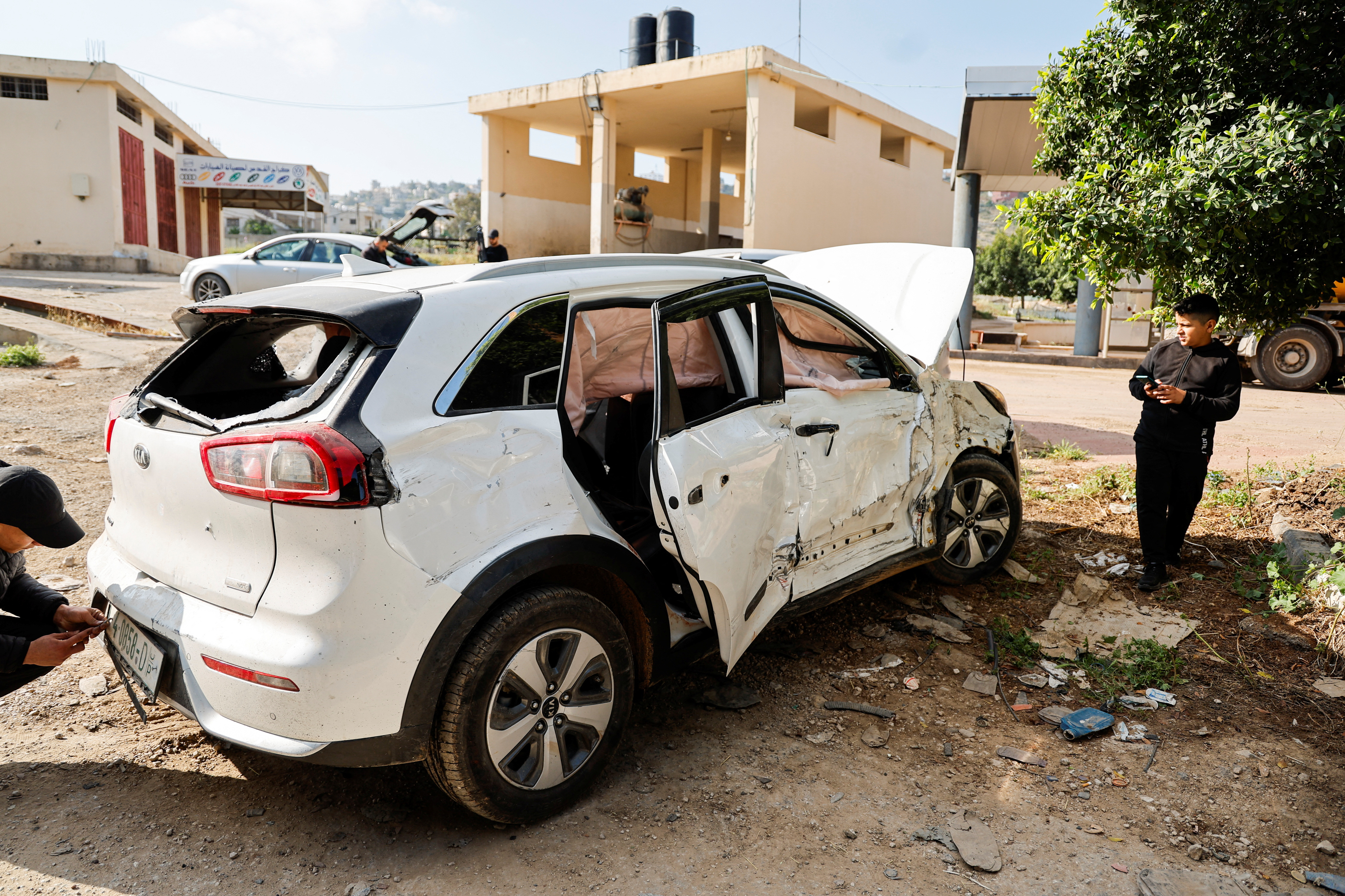 Car targeted by Israeli forces during a raid where they killed a Palestinian militant, near Tubas