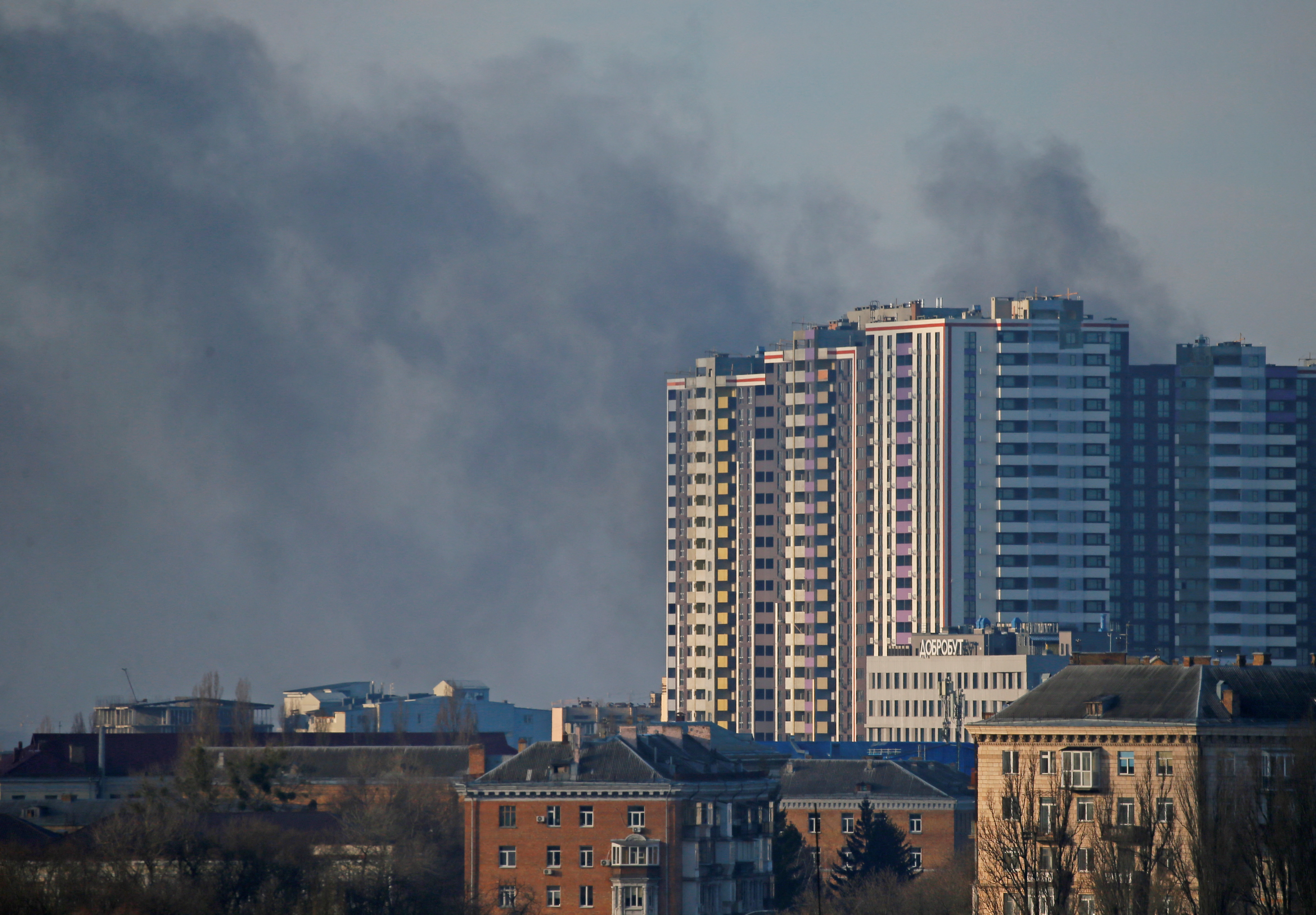 Smoke rises after recent shelling in Kyiv, Ukraine February 26, 2022. REUTERS/Gleb Garanich