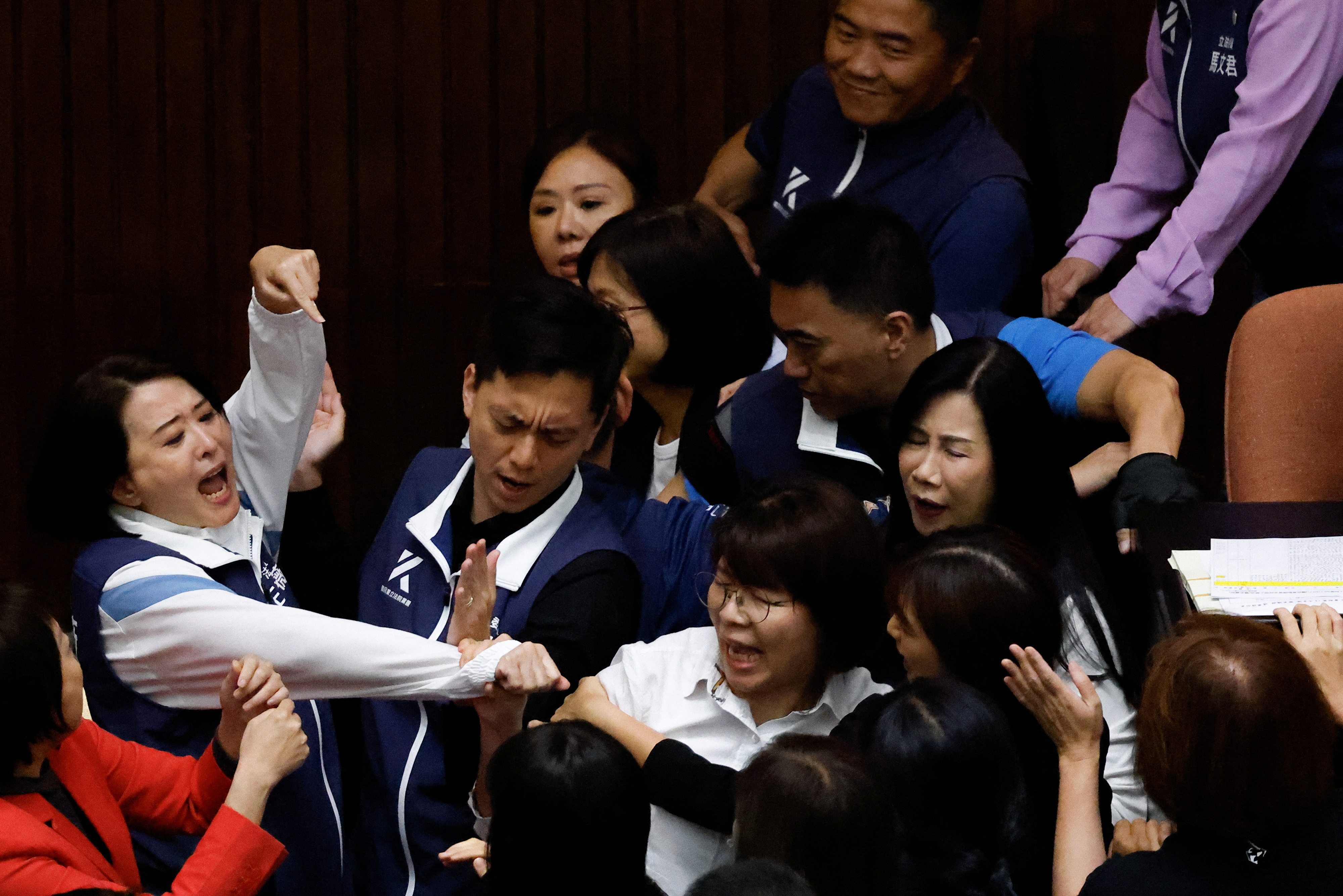 Taiwan lawmakers argue and exchange blows during a parliamentary session in Taipei