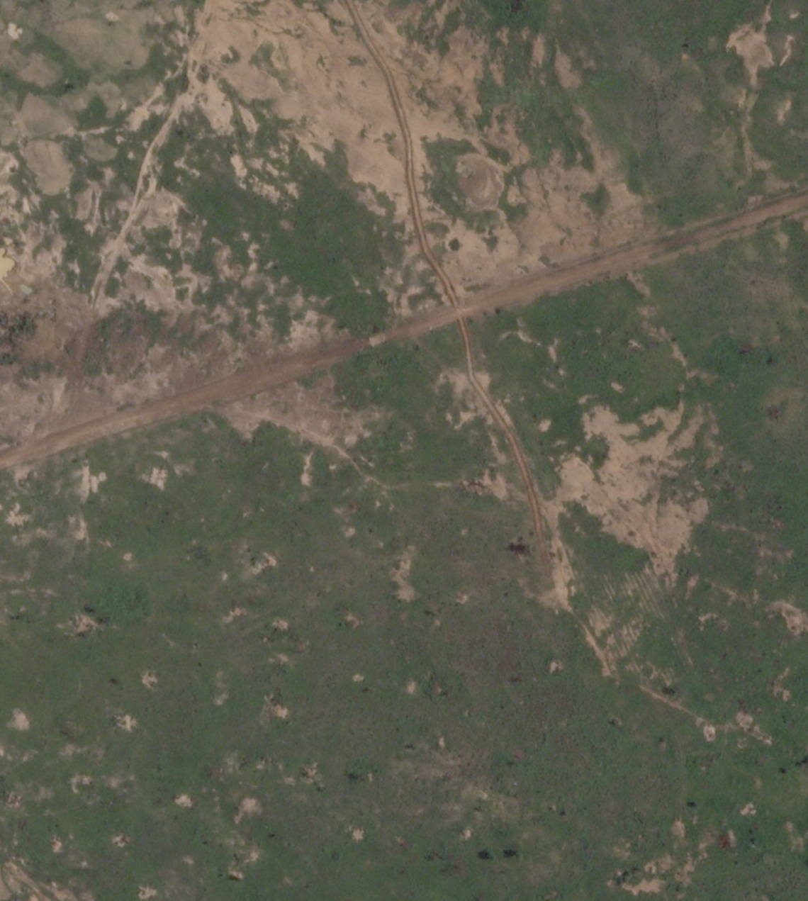 A satellite image shows a newly-built trench near Barsalogho