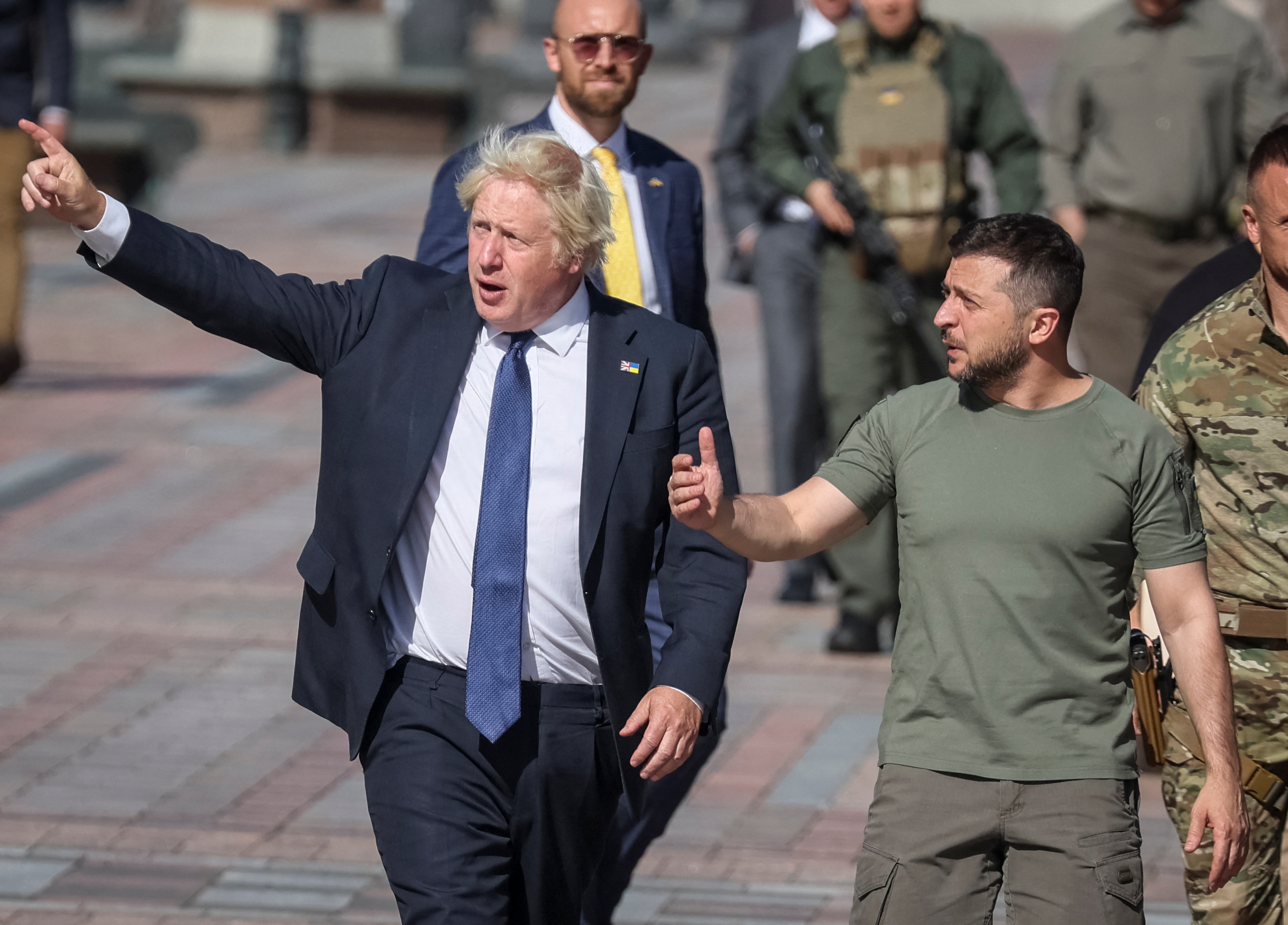 Ukraine's President Zelenskiy and British Prime Minister Johnson walk in central Kyiv