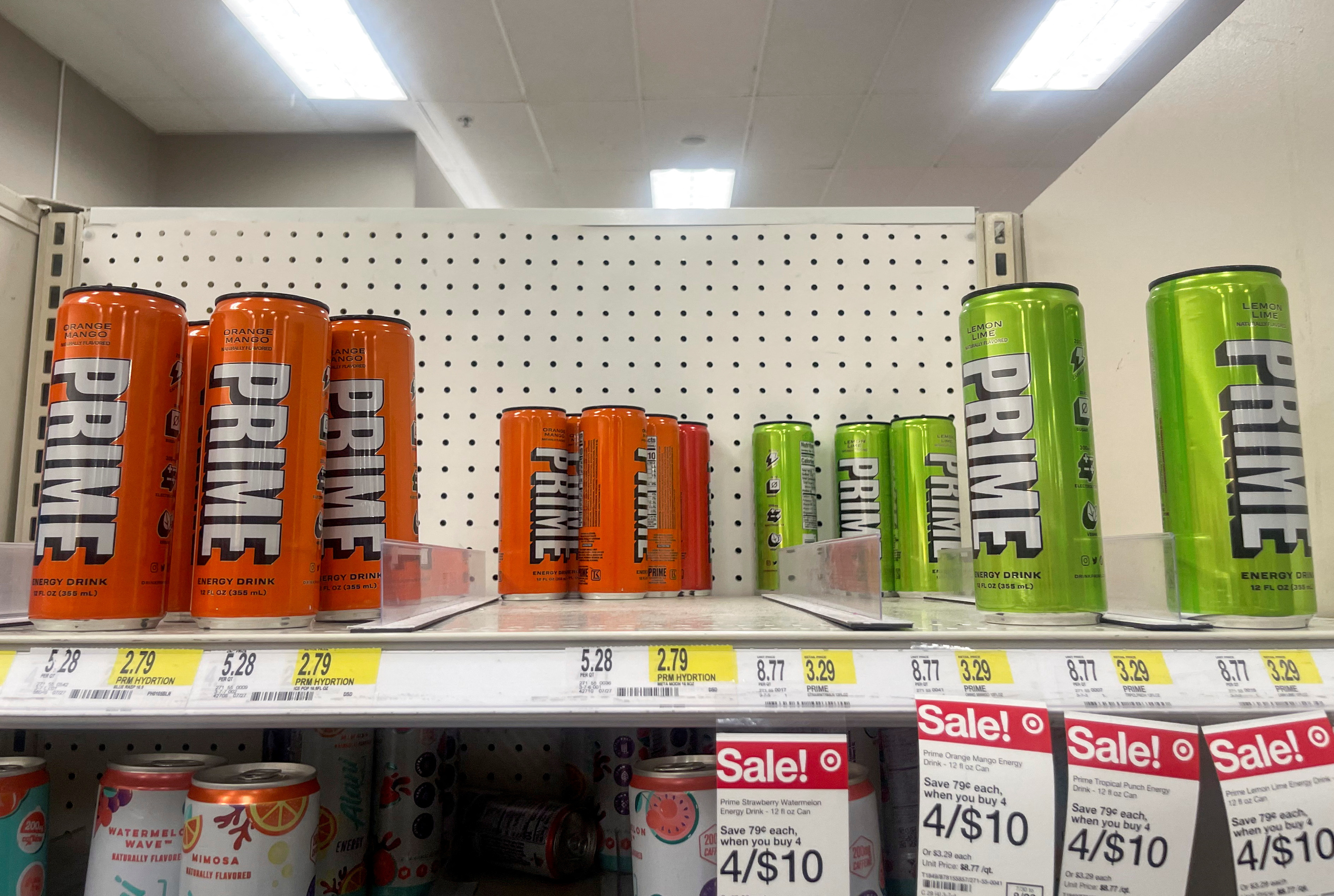 Prime energy drink cans sit on a shelf at Target in Brooklyn, New York