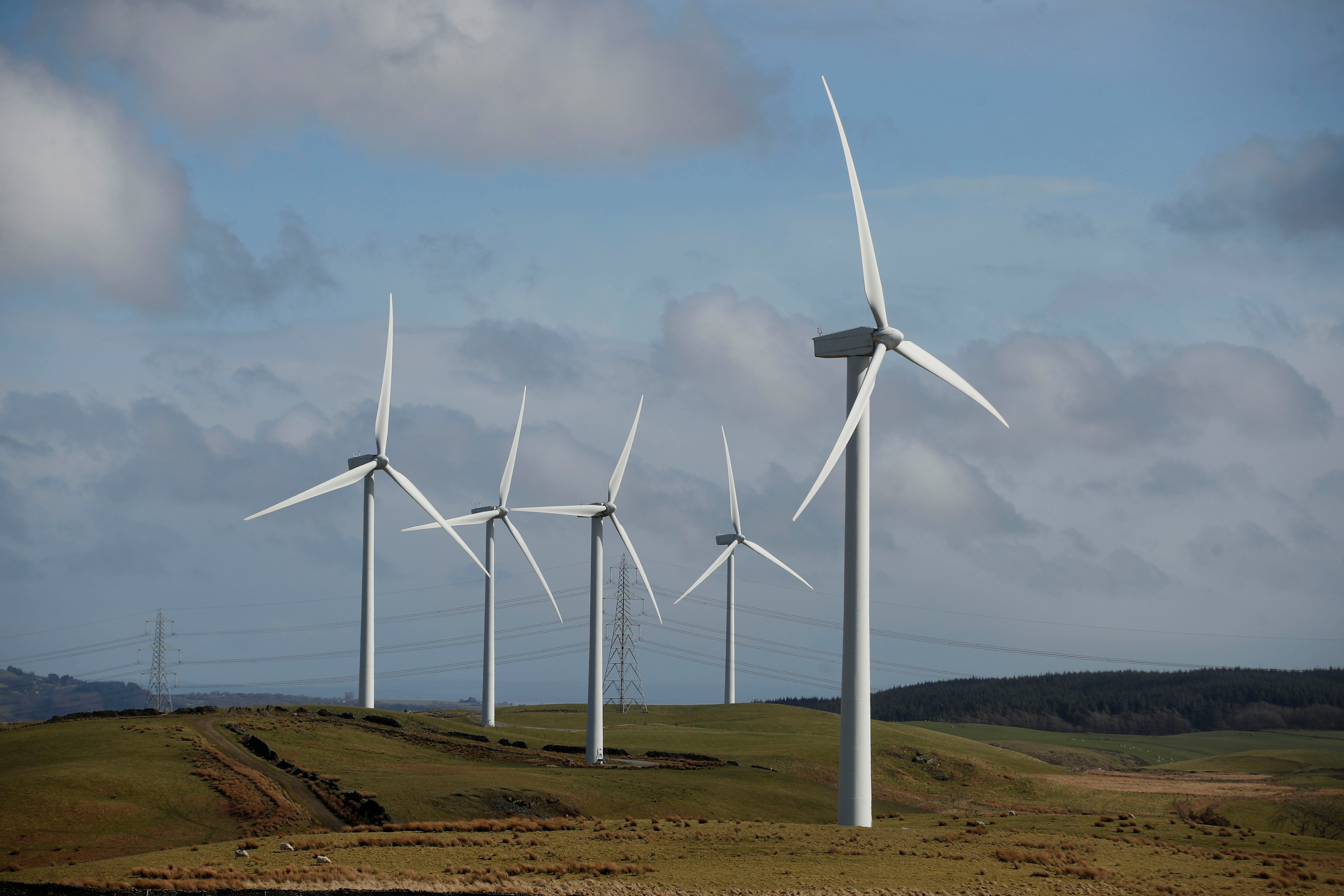 Wind turbines are seen at Mynydd Portref Wind Farm near Hendreforgan in South Wales, Britain, March 26, 2021. REUTERS/Matthew Childs