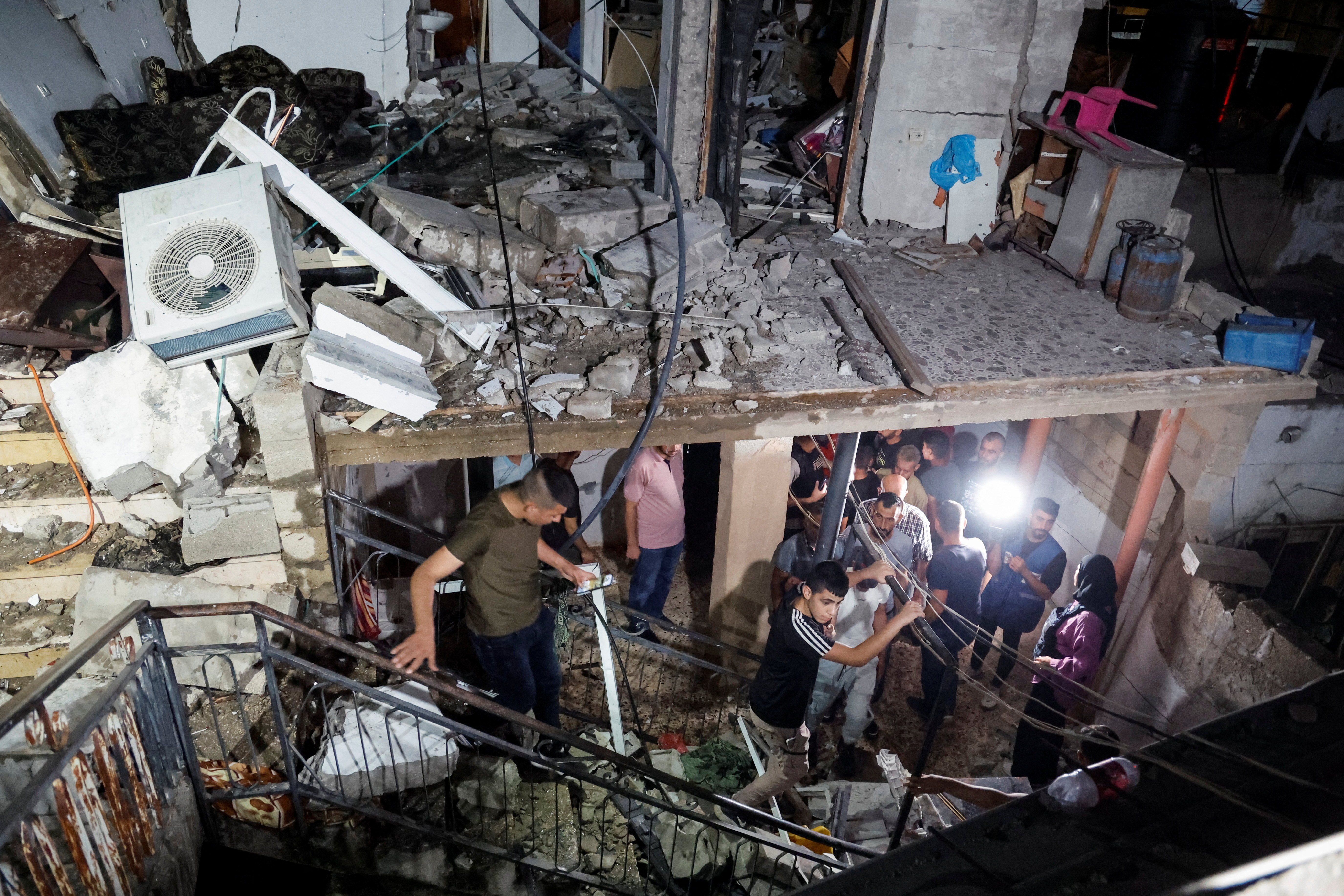 Aftermath of an Israeli raid, in Kafr Dan