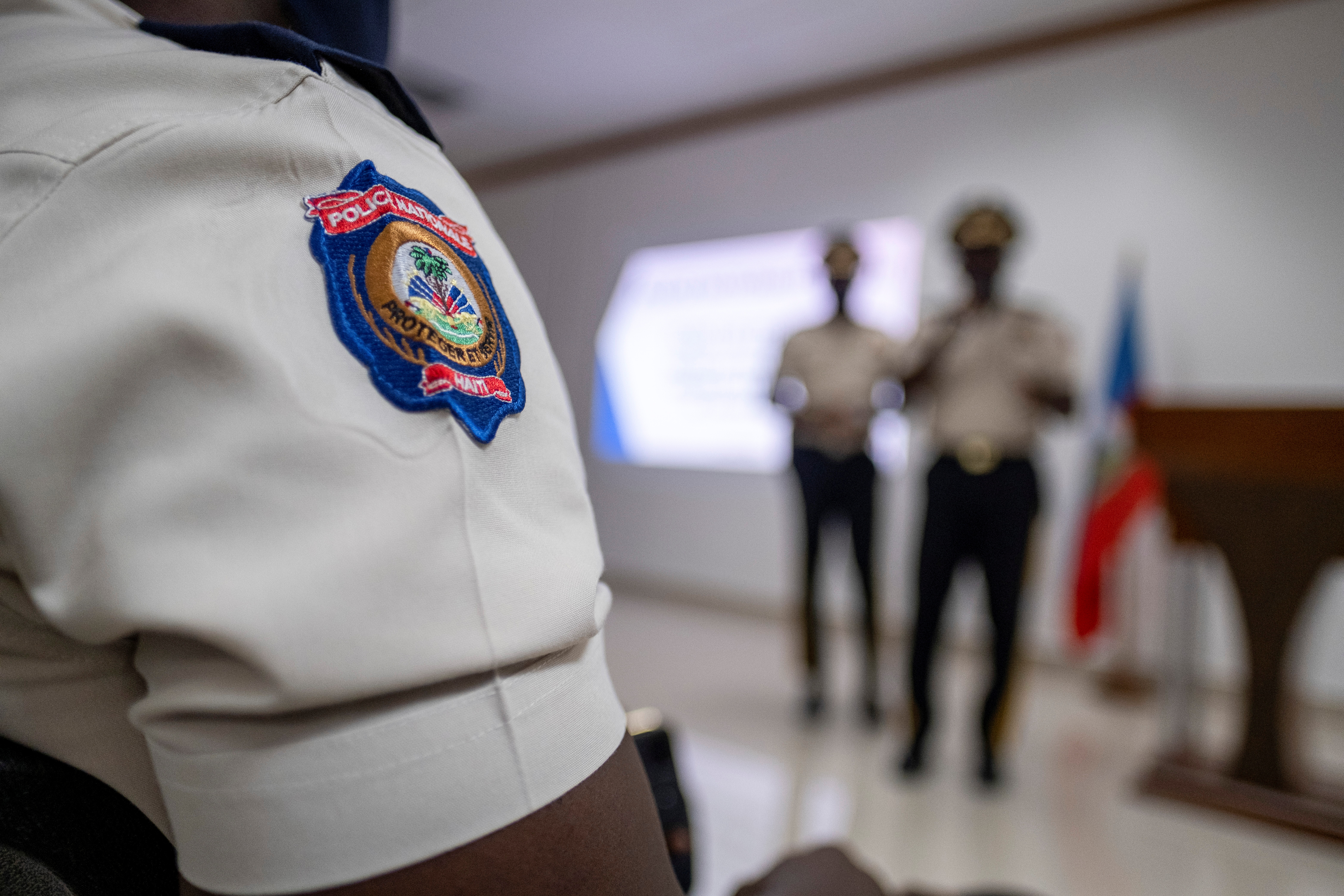 A Haitian National Police officer attends Haitian's Police Director General Leon Charles press conference in Port-au-Prince, Haiti July 15, 2021. REUTERS/Ricardo Arduengo