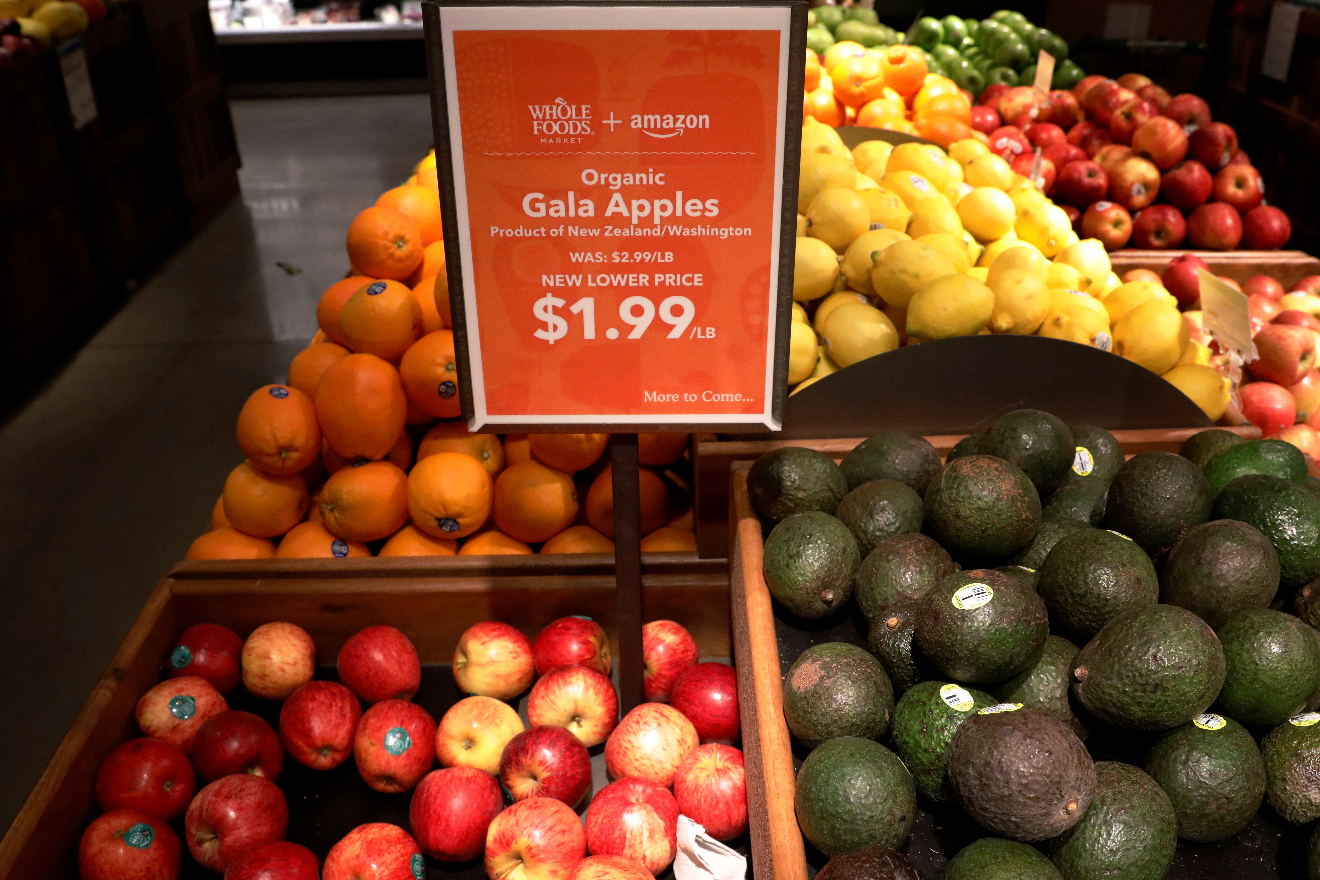 Apples and Avocados are displayed at a Whole Foods store in New York