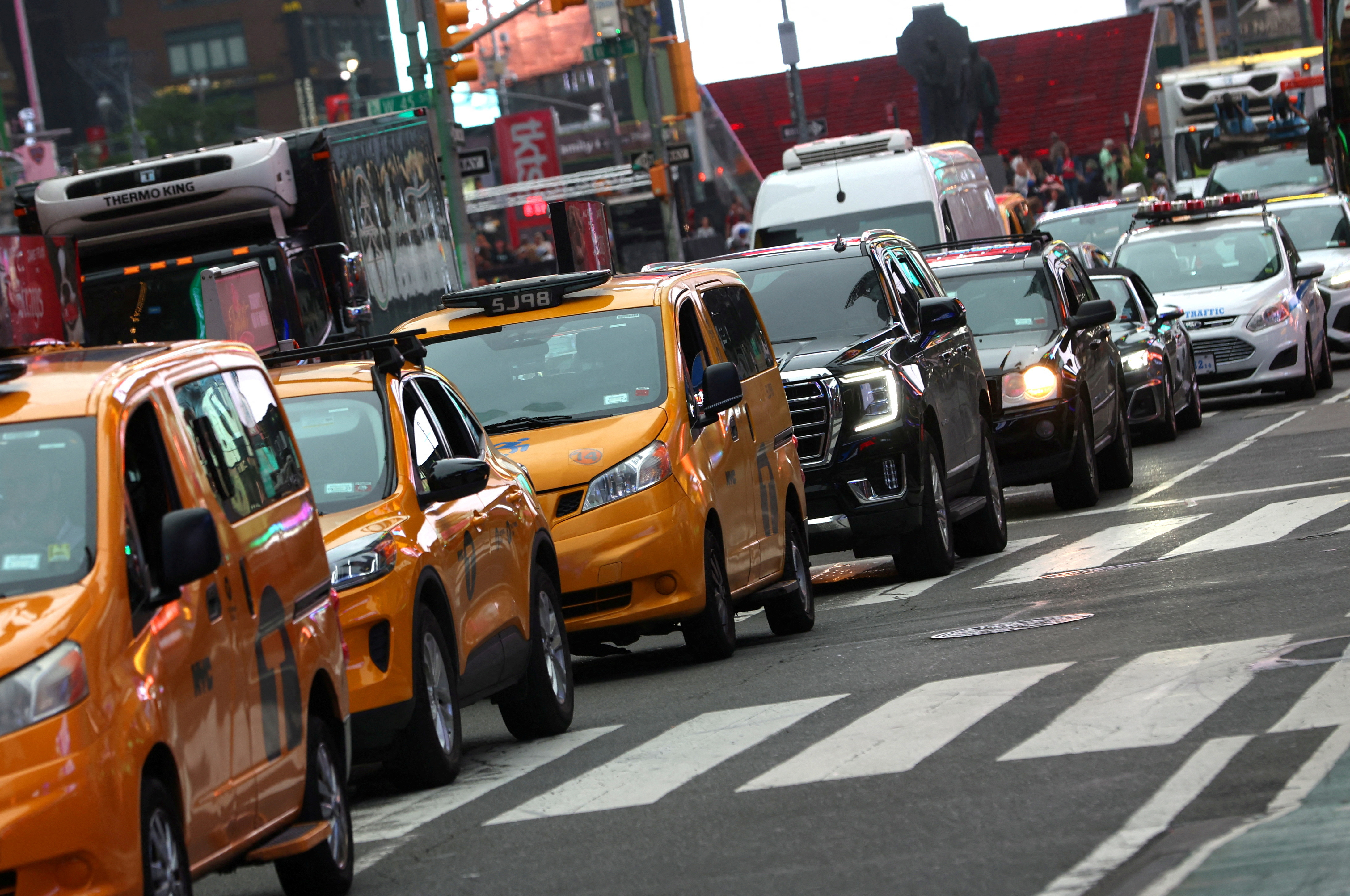 Vehicles sit in a line of traffic in Times Square in Manhattan in New York City