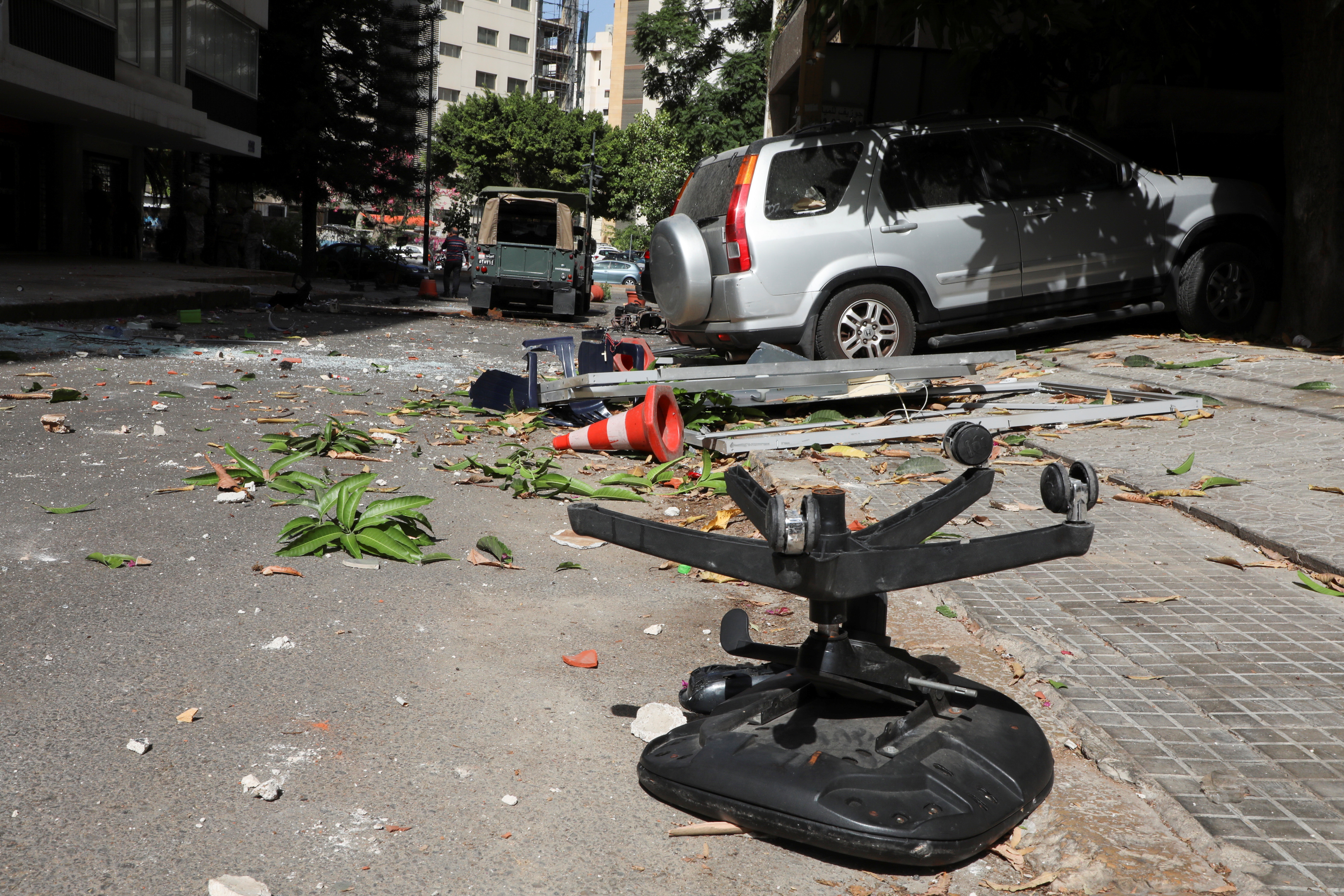 Shattered glass and debris are seen after gunfire erupted in Beirut