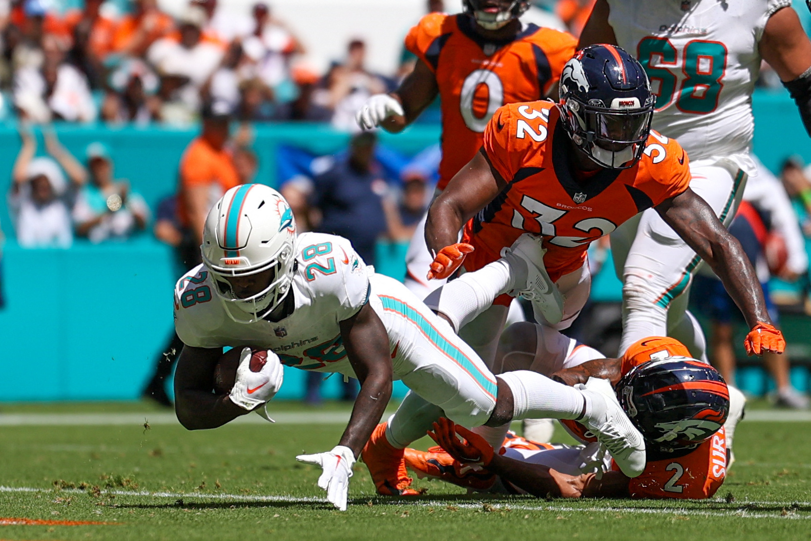 NFL roundup: Dolphins score 70 points in routing Broncos