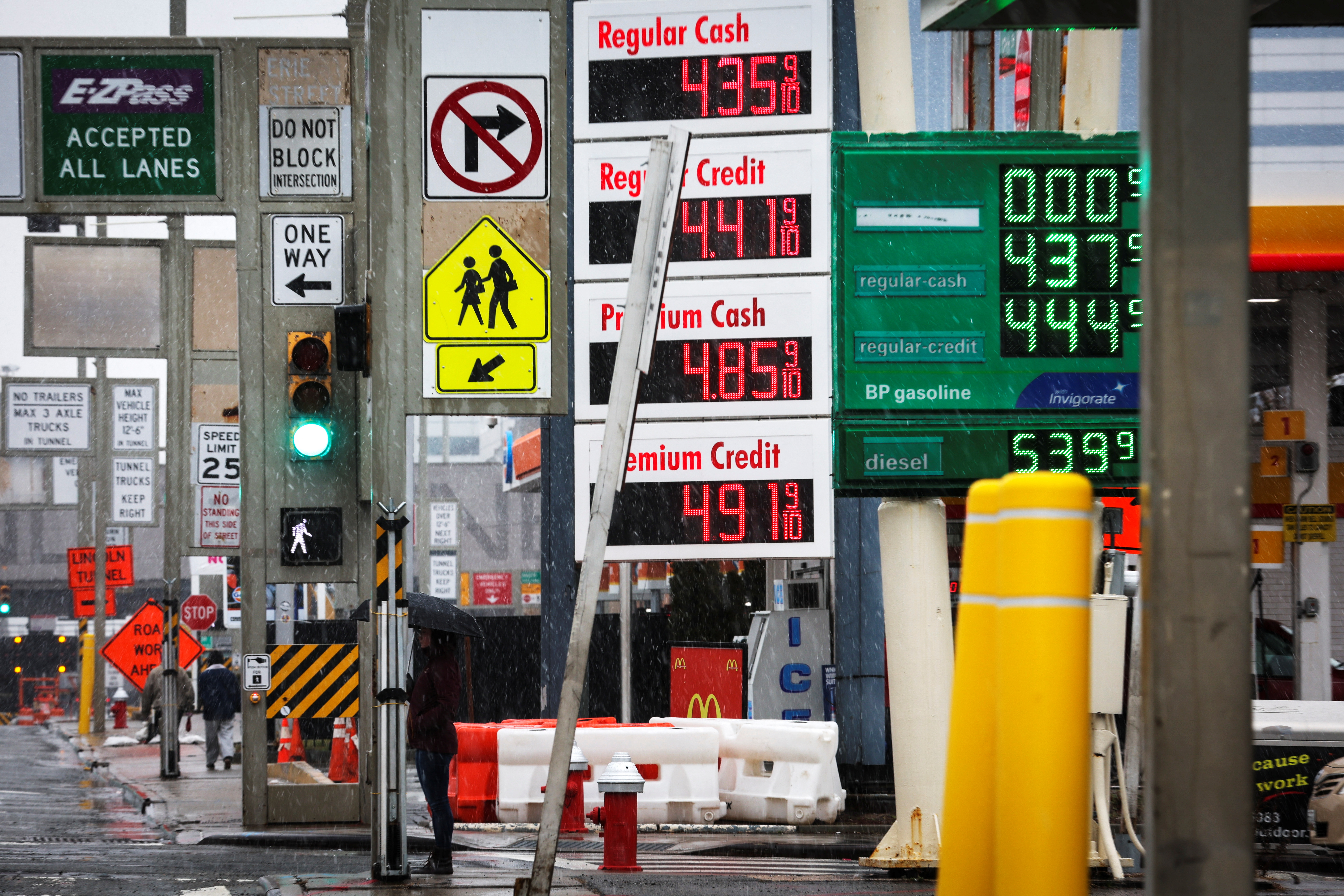 Gasoline prices are displayed at gas stations in Jersey City, New Jersey