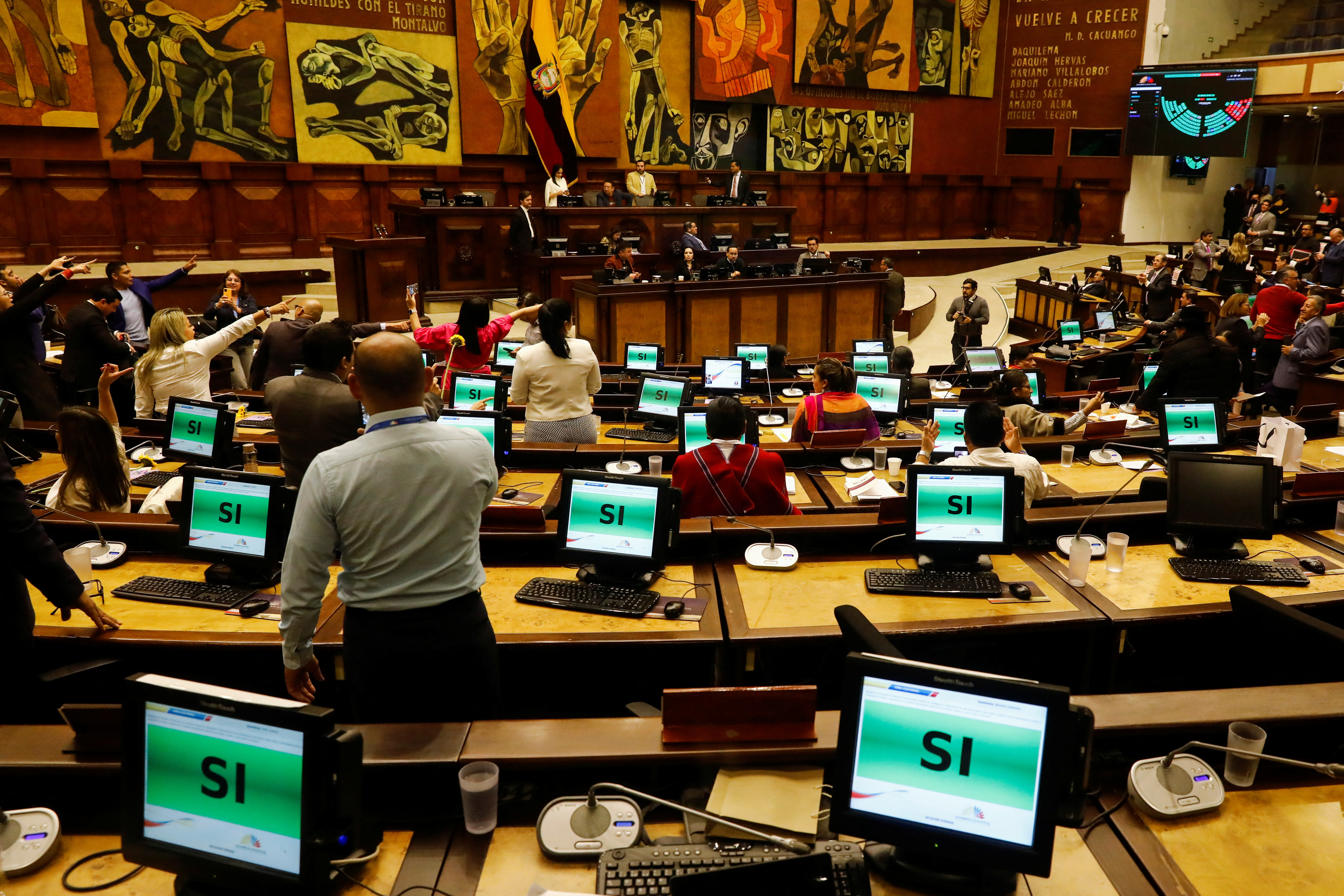 Legislators of Ecuador's National Assembly attend a session to debate a report recommending the opening of impeachment hearings against President Guillermo Lasso, in Quito
