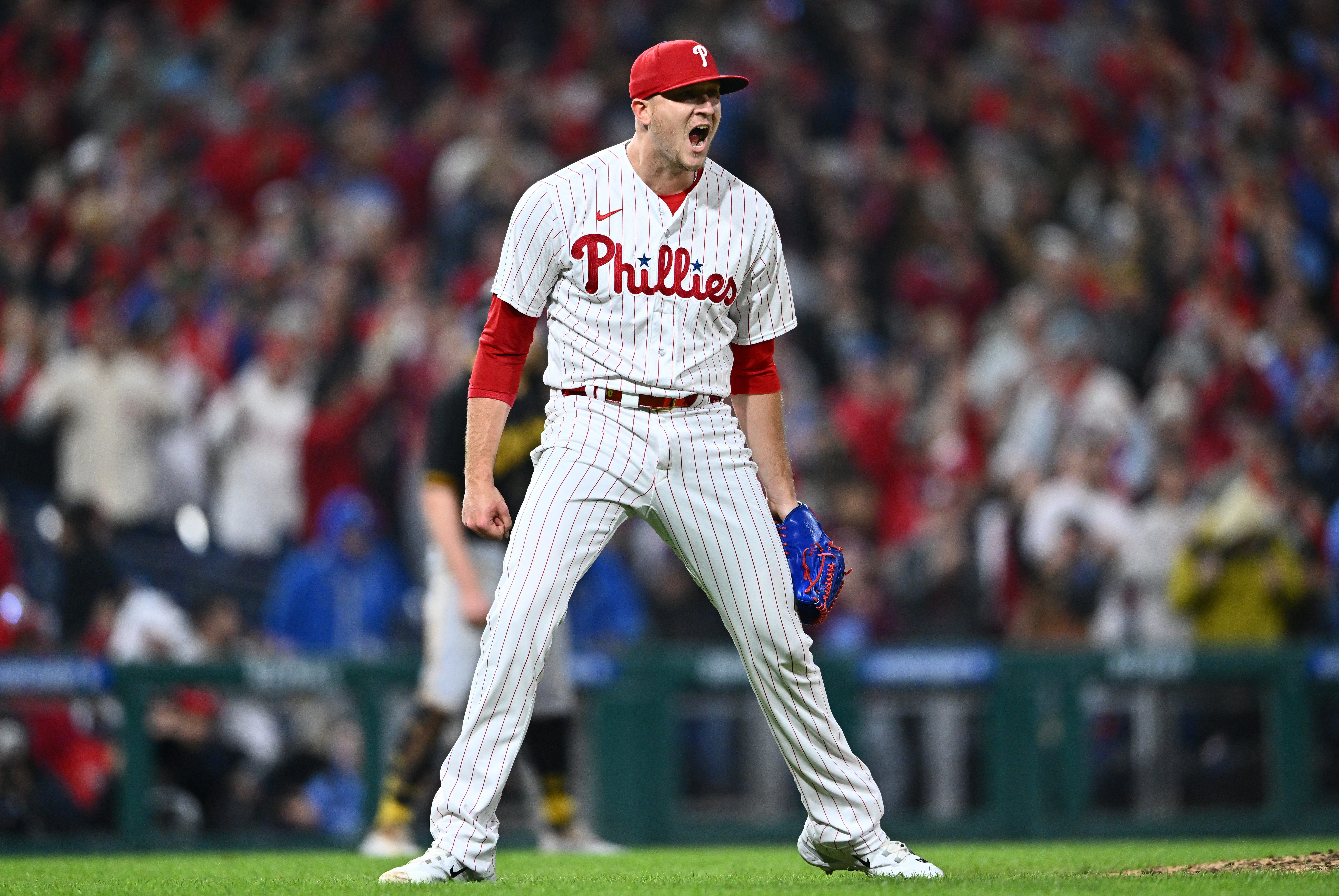 Phillies win in 10 to punch playoff ticket, Sports